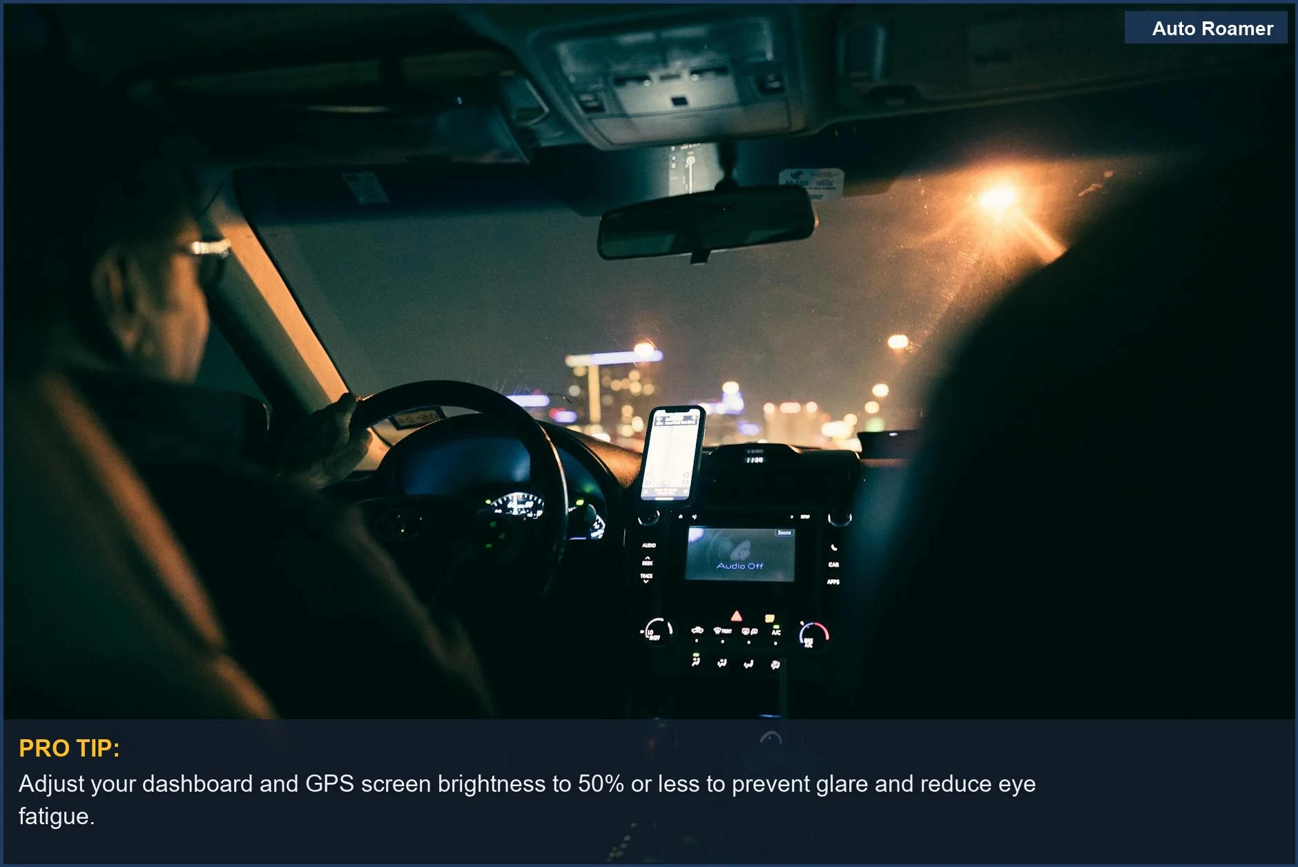 A driver navigating a city at night, using a GPS, highlights the need for minimizing eye strain during night driving.