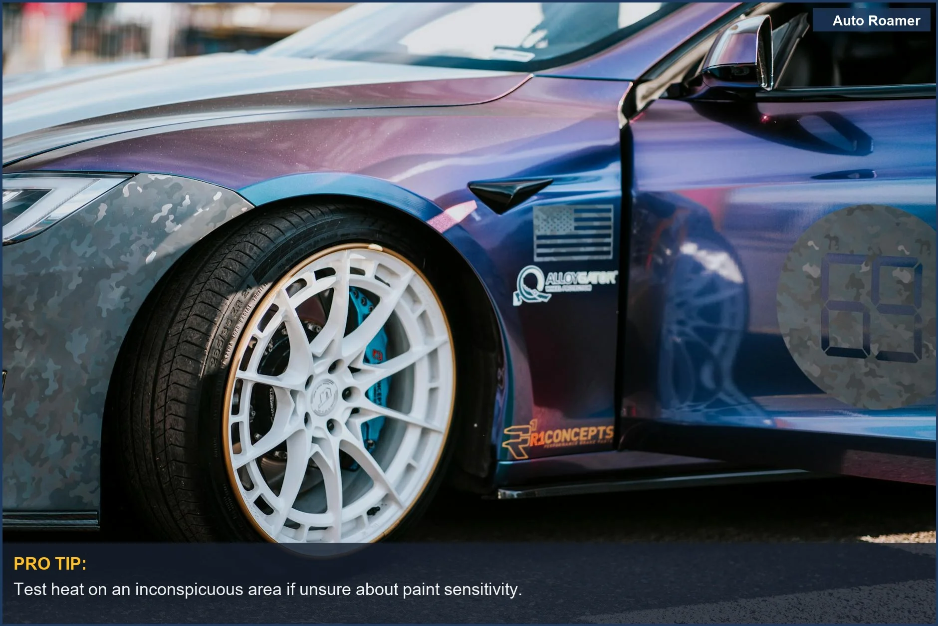 Close-up showing a dealer sticker on a new Toyota being removed with a hairdryer.