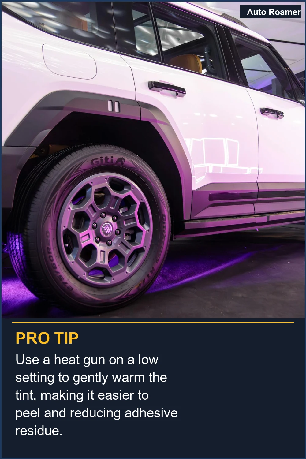 Use a heat gun on a low setting to gently warm the tint, making it easier to peel and reducing adhesive residue.