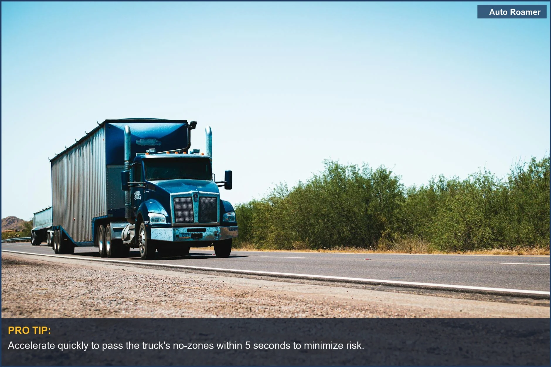 Blue semi truck on a rural highway, illustrating the importance of understanding semi truck blind spots.