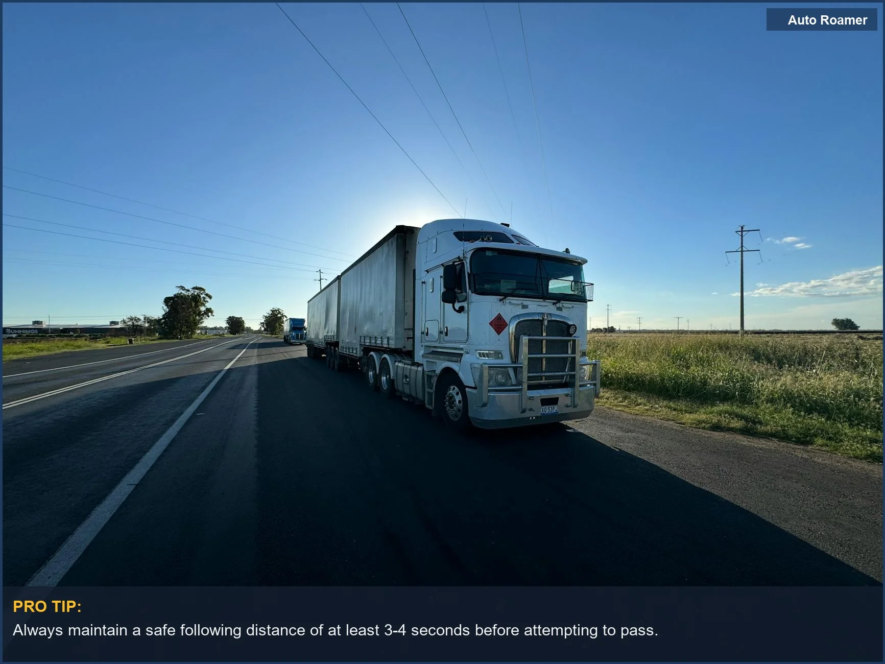 Silver semi truck on an open highway, showing safe passing techniques for semi trucks on the highway.