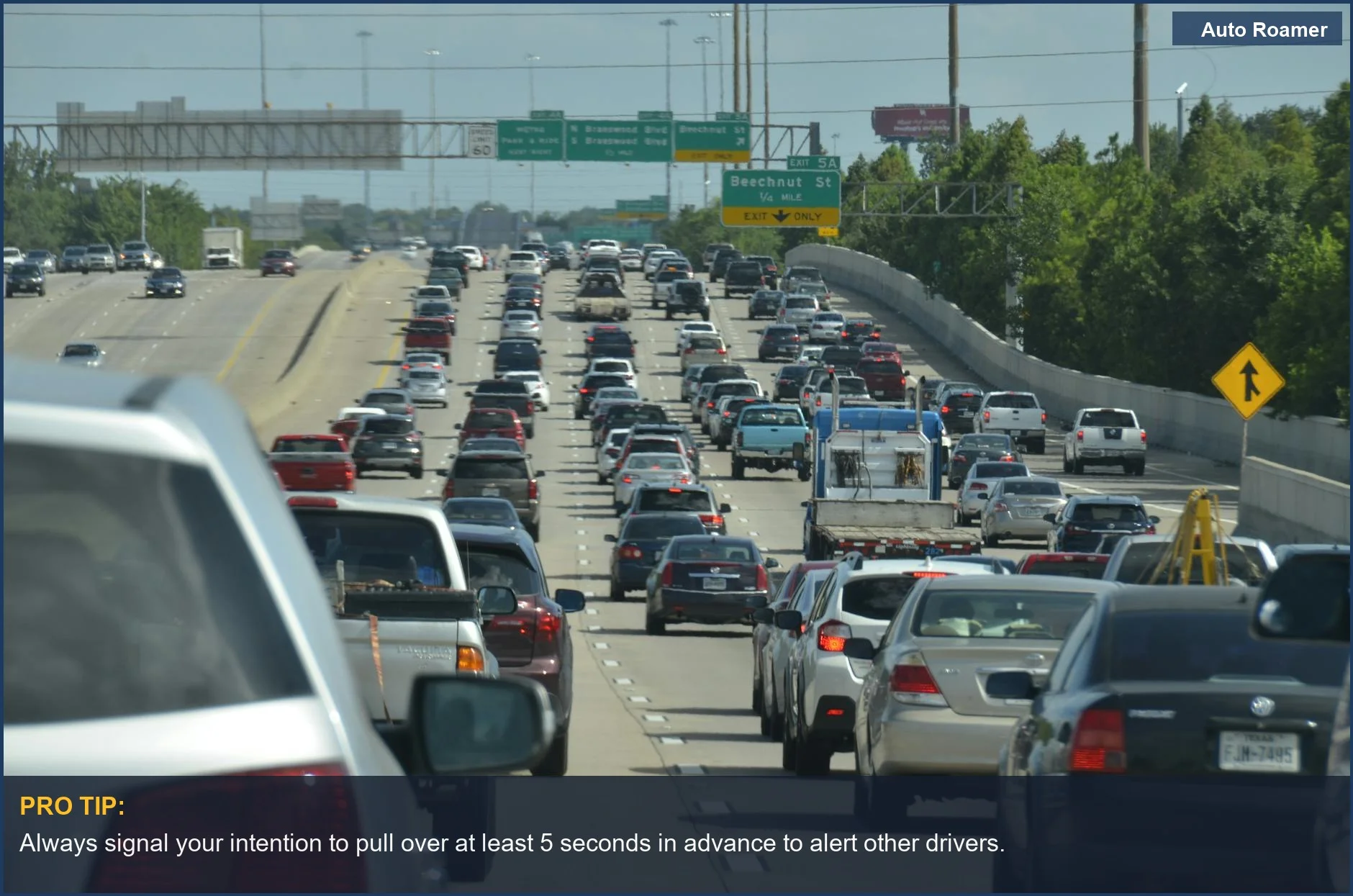 Dense urban expressway traffic during the day, crucial for safely pulling over on a busy road.