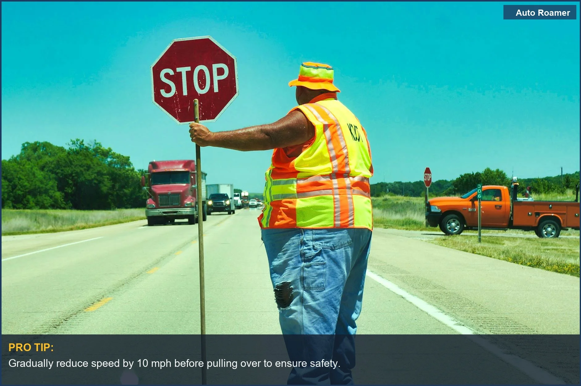 Road construction worker holding a stop sign ensuring traffic safety while pulling over on the highway.
