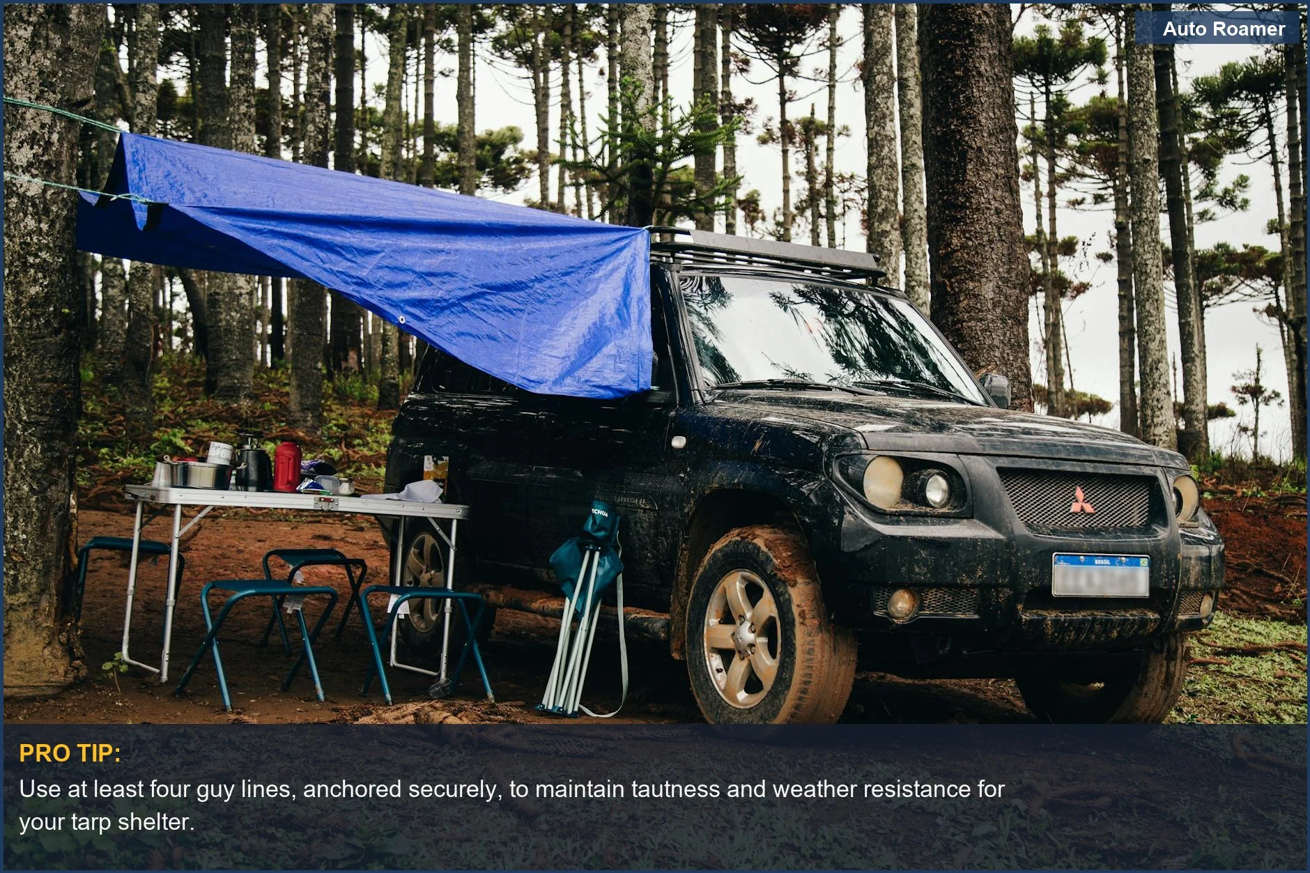 SUV and camping gear set up with a tarp, illustrating a comfortable car camping shelter in a forest.