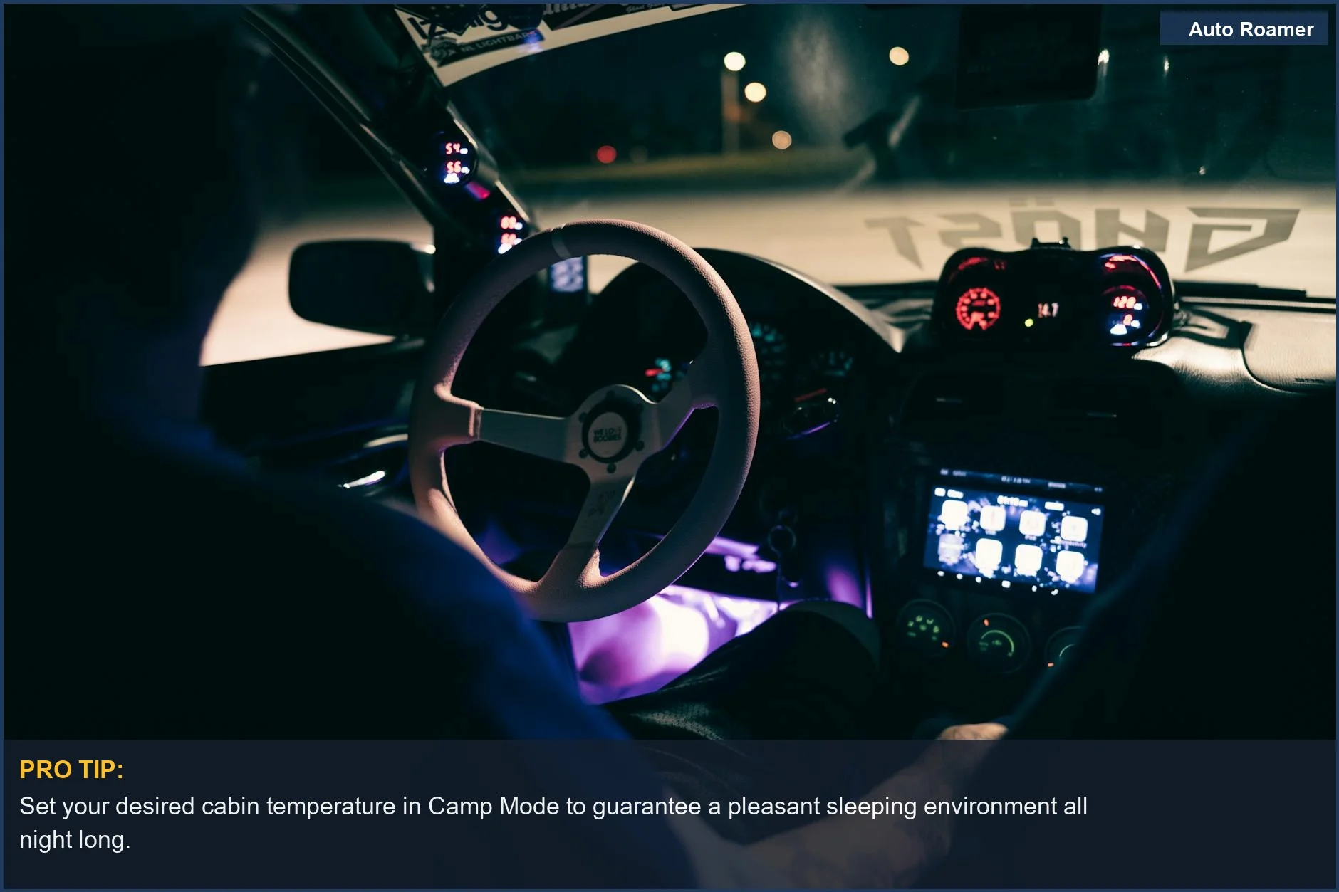 Tesla Model 3 interior at night with bright dashboard and steering wheel, showcasing technology for car camping.
