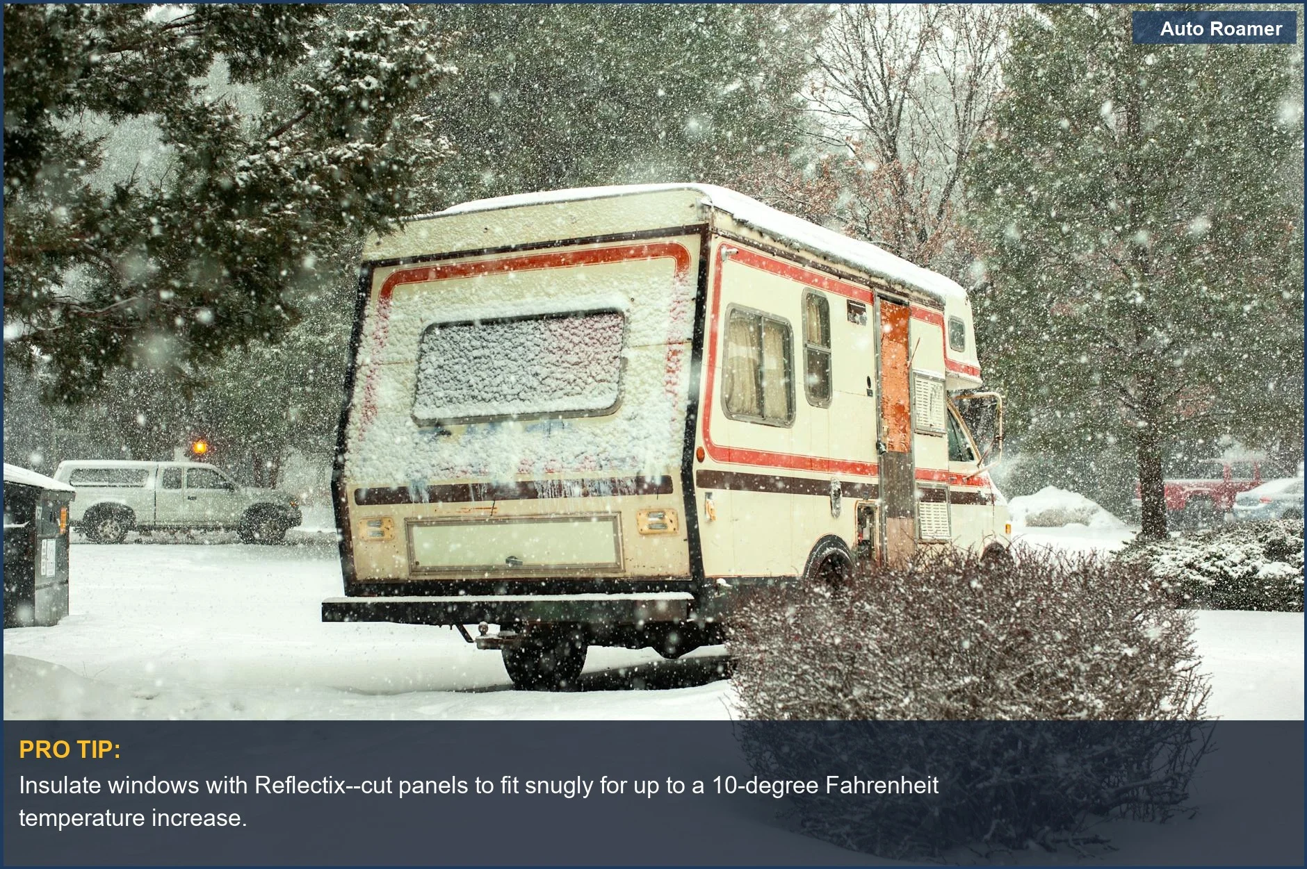A campervan nestled in deep snow, surrounded by snow-covered trees, illustrating how to stay warm car camping in winter.