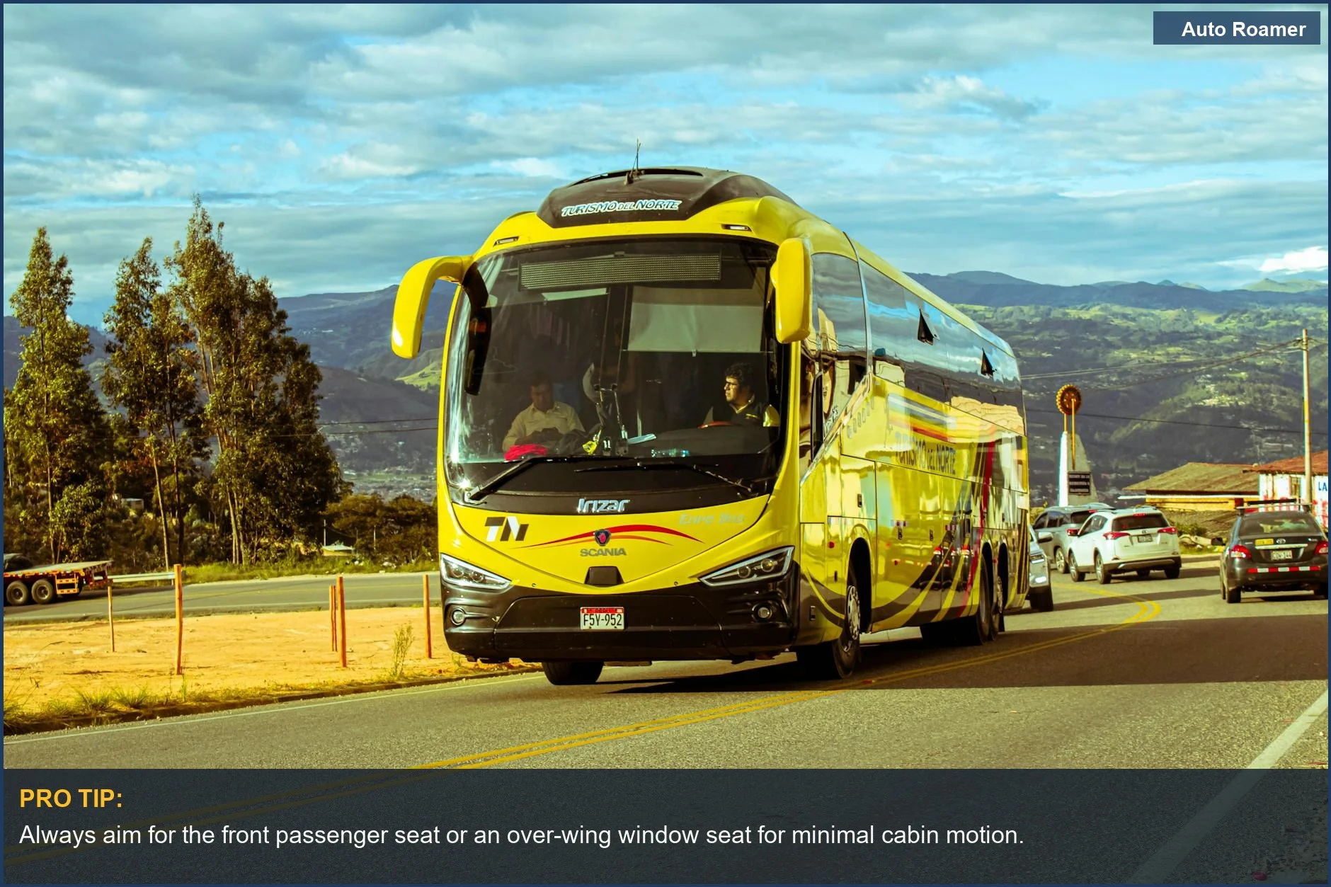 Observe a bright yellow bus on a scenic mountain road, emphasizing optimal seating to prevent motion sickness on winding mountain roads.