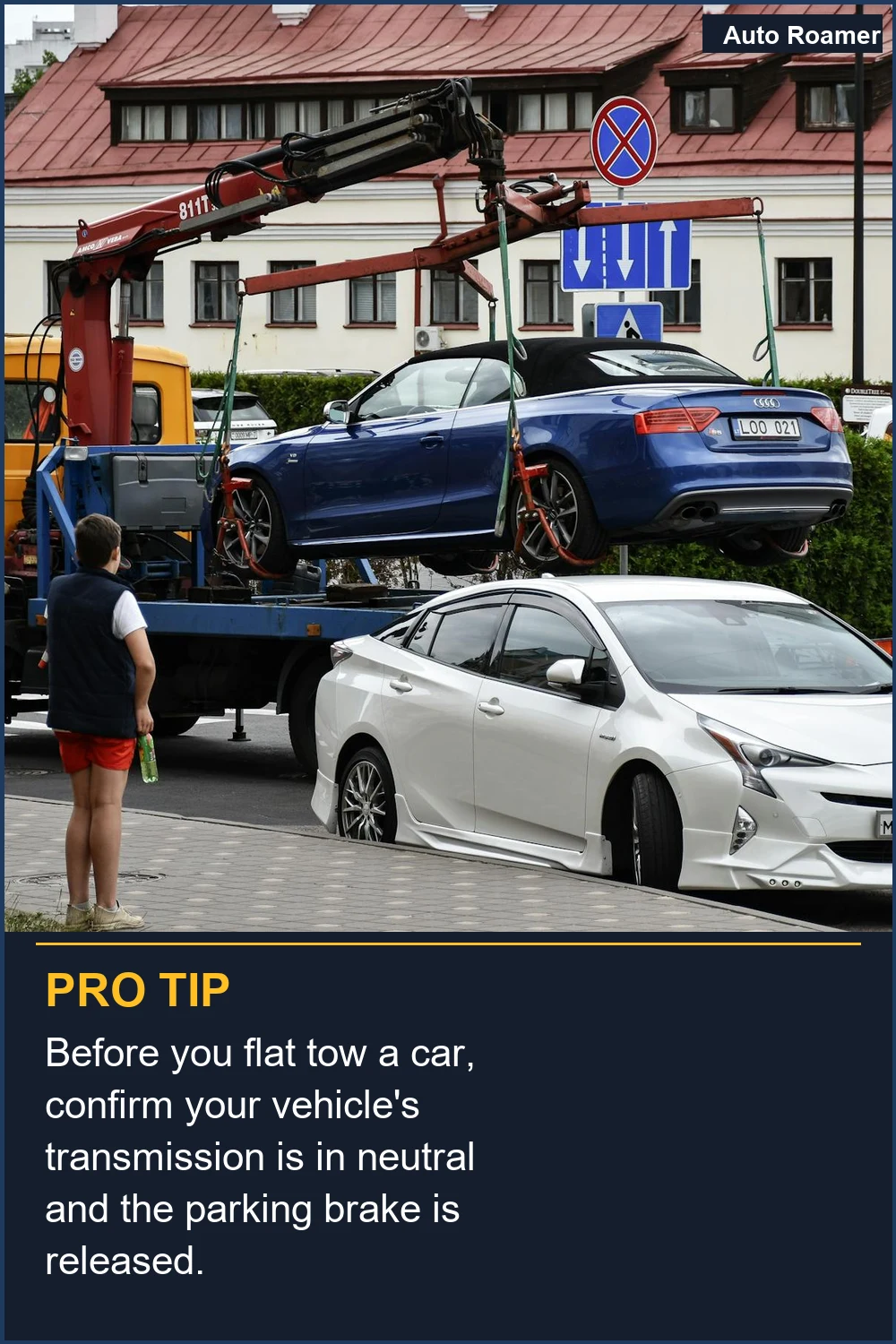 Before you flat tow a car, confirm your vehicle's transmission is in neutral and the parking brake is released.