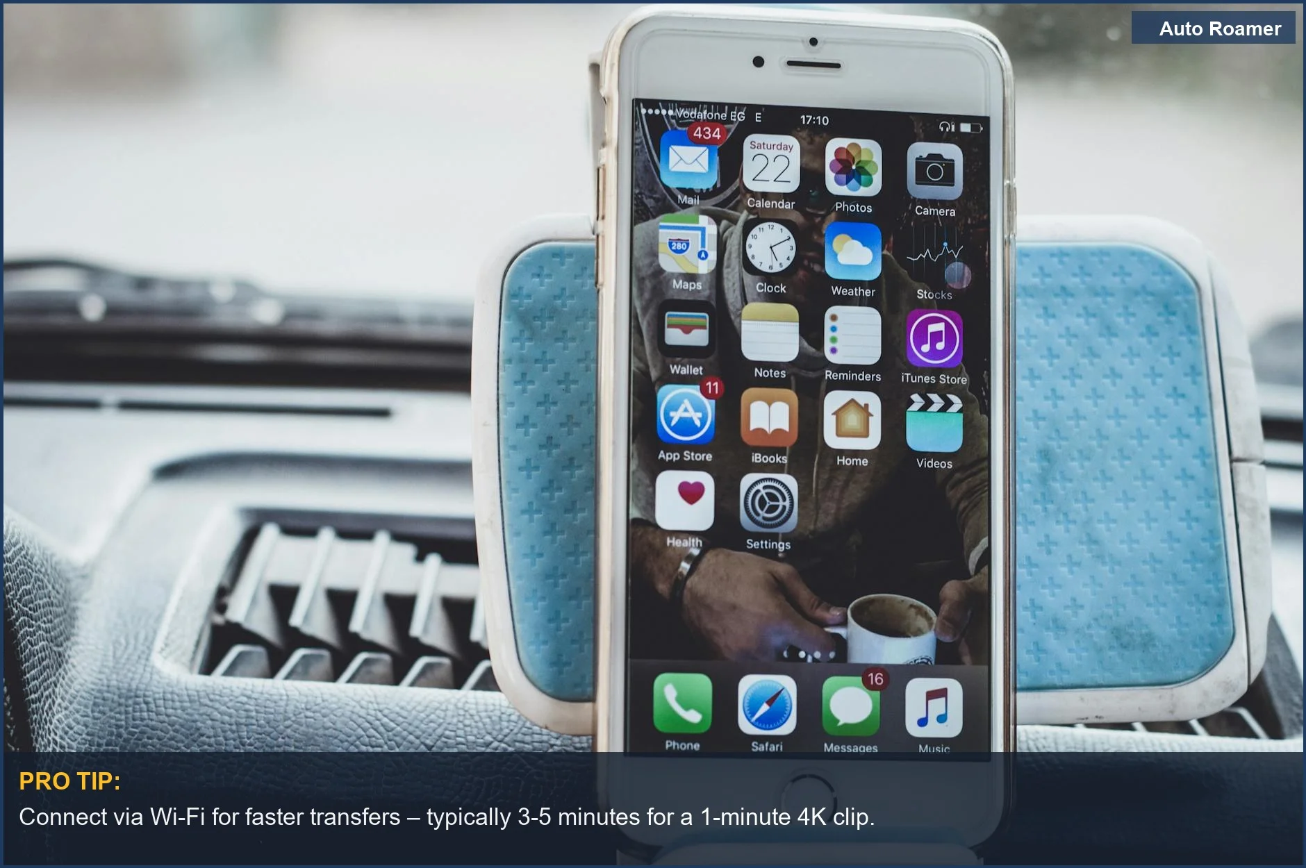 A smartphone displayed on a car dashboard, showing apps – perfect for quickly transferring dashcam footage to your phone.