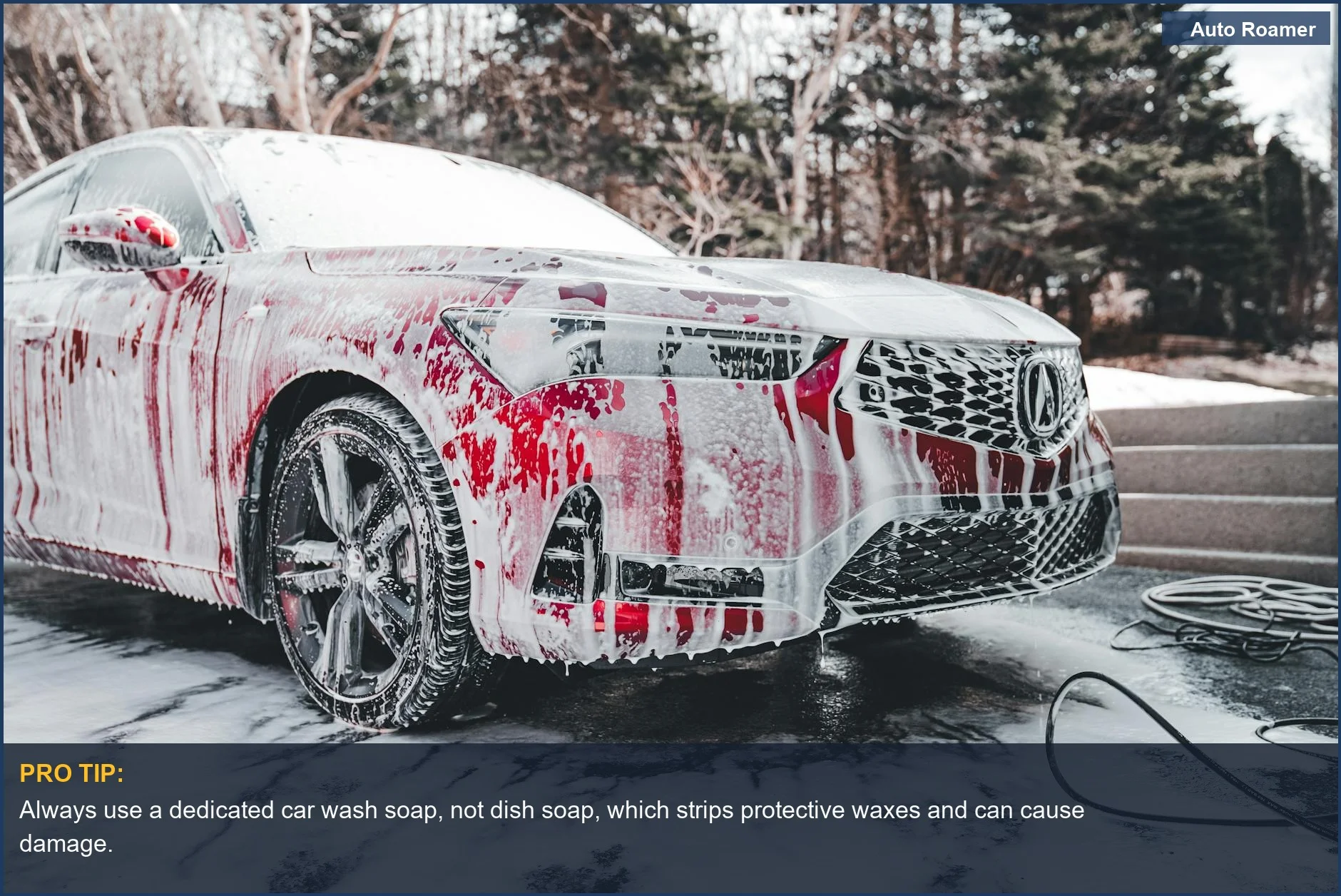 Vibrant red car covered in foam, demonstrating how to wash your car without scratching paint.