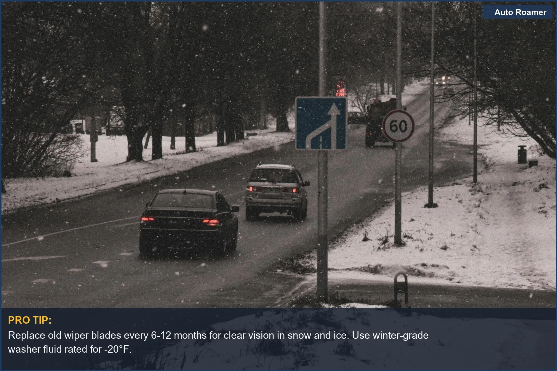 Multiple cars drive carefully on a snow-covered road during heavy snowfall, highlighting the need for preparing your car for winter driving.