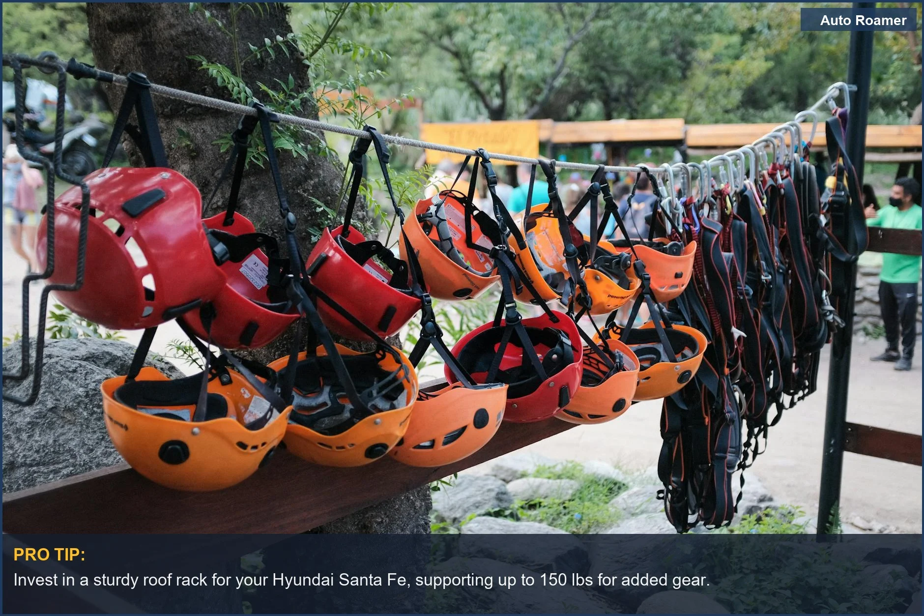 Colorful climbing helmets hanging, symbolizing adventure gear