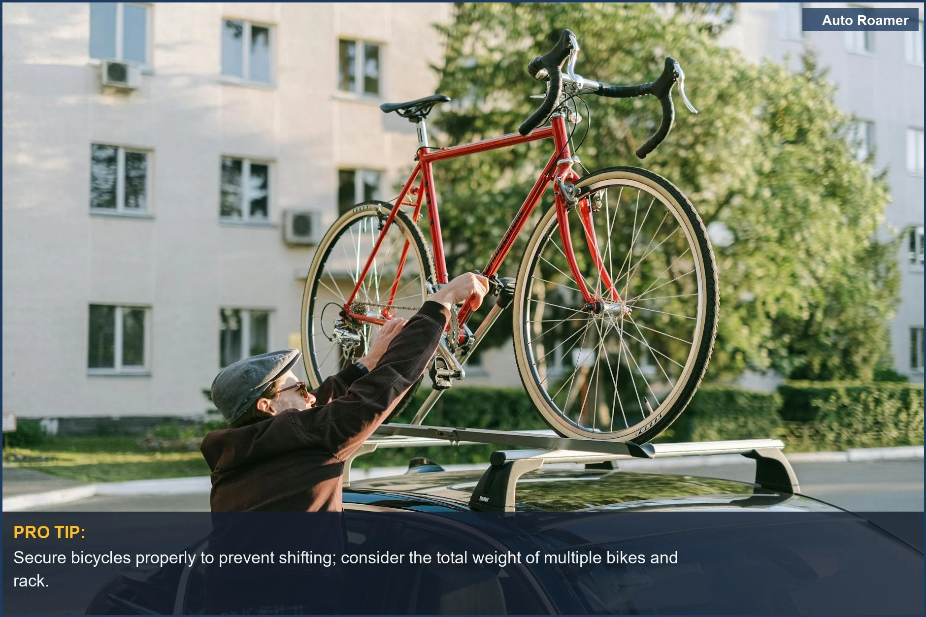 Man securing a bicycle to an aftermarket roof rack on a car, relevant to Santa Fe rack capacity.