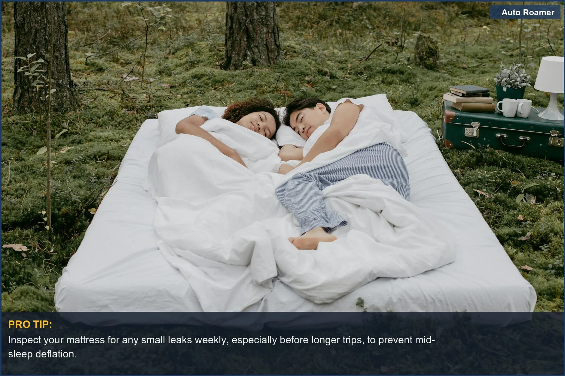 A couple relaxing on a comfortable car camping mattress in a serene forest setting, demonstrating the benefits of good camping mattress maintenance.