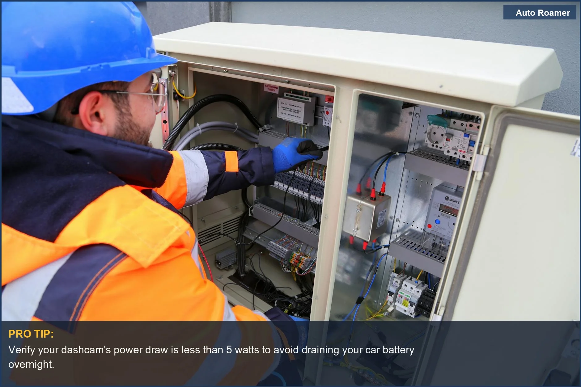 Expert in safety gear checks outdoor electrical panel for car camping electrical safety.