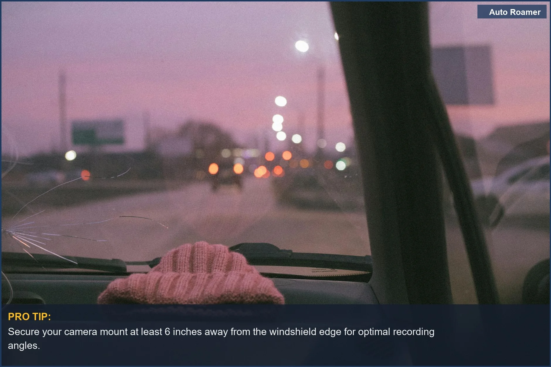 DIY RV dash cam setup with a knit hat on the dashboard, suggesting alternative mounting options for better views.