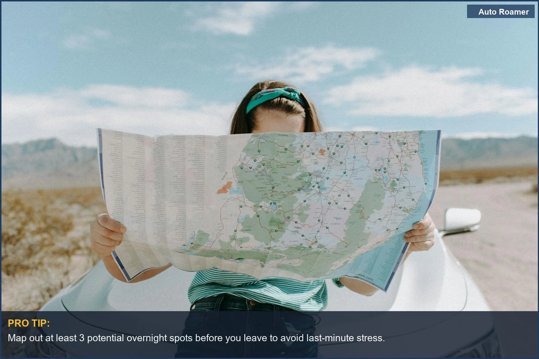 Woman with map in scenic California desert, essential for planning solo female car camping routes.