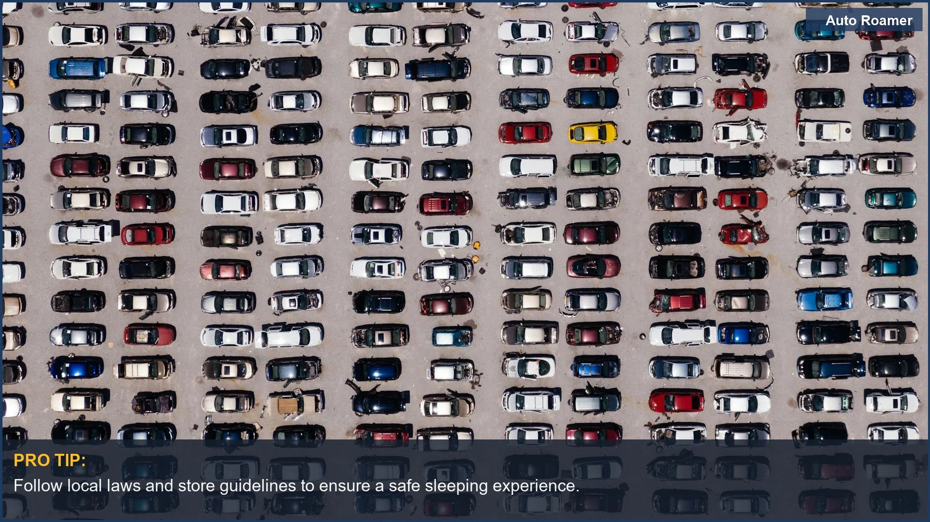 Aerial view of a large parking lot filled with cars, examining sleeping legality.