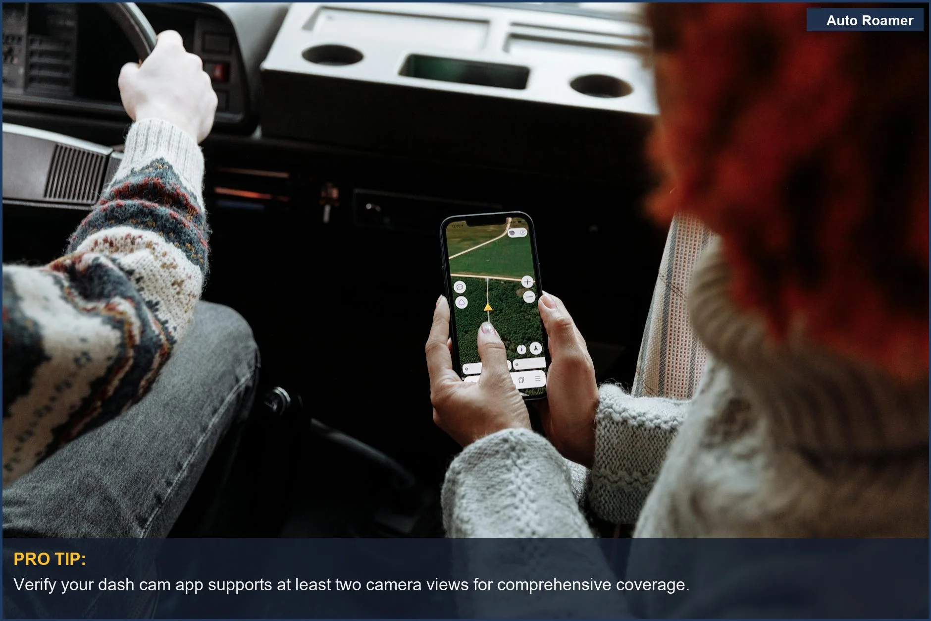 Two people use a navigation app on a phone during a road trip, illustrating app use.