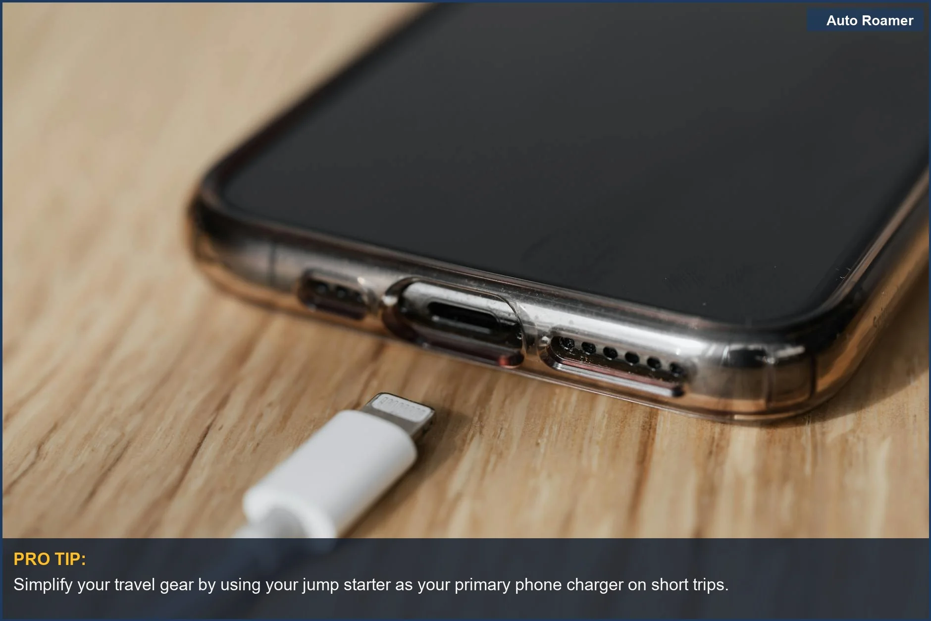 Close-up of a smartphone's USB-C charging port and a white cable.