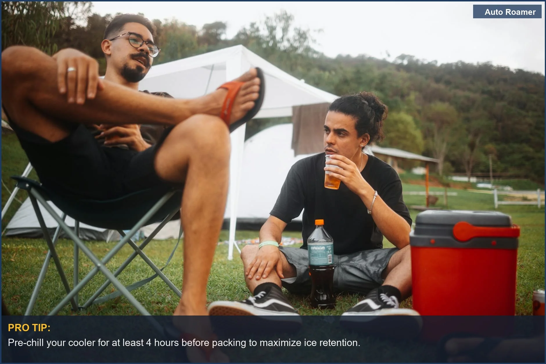 Young men enjoy a car camping picnic with a cooler, demonstrating effective food storage for outdoor adventures.