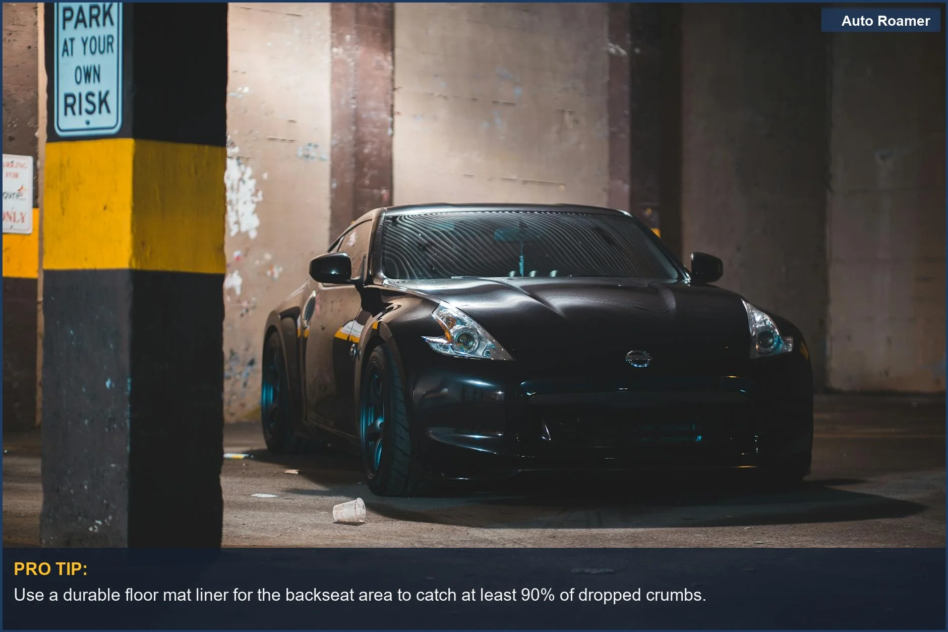 Modern coupe parked near a warning sign, illustrating the need for preventative measures against family car damage.