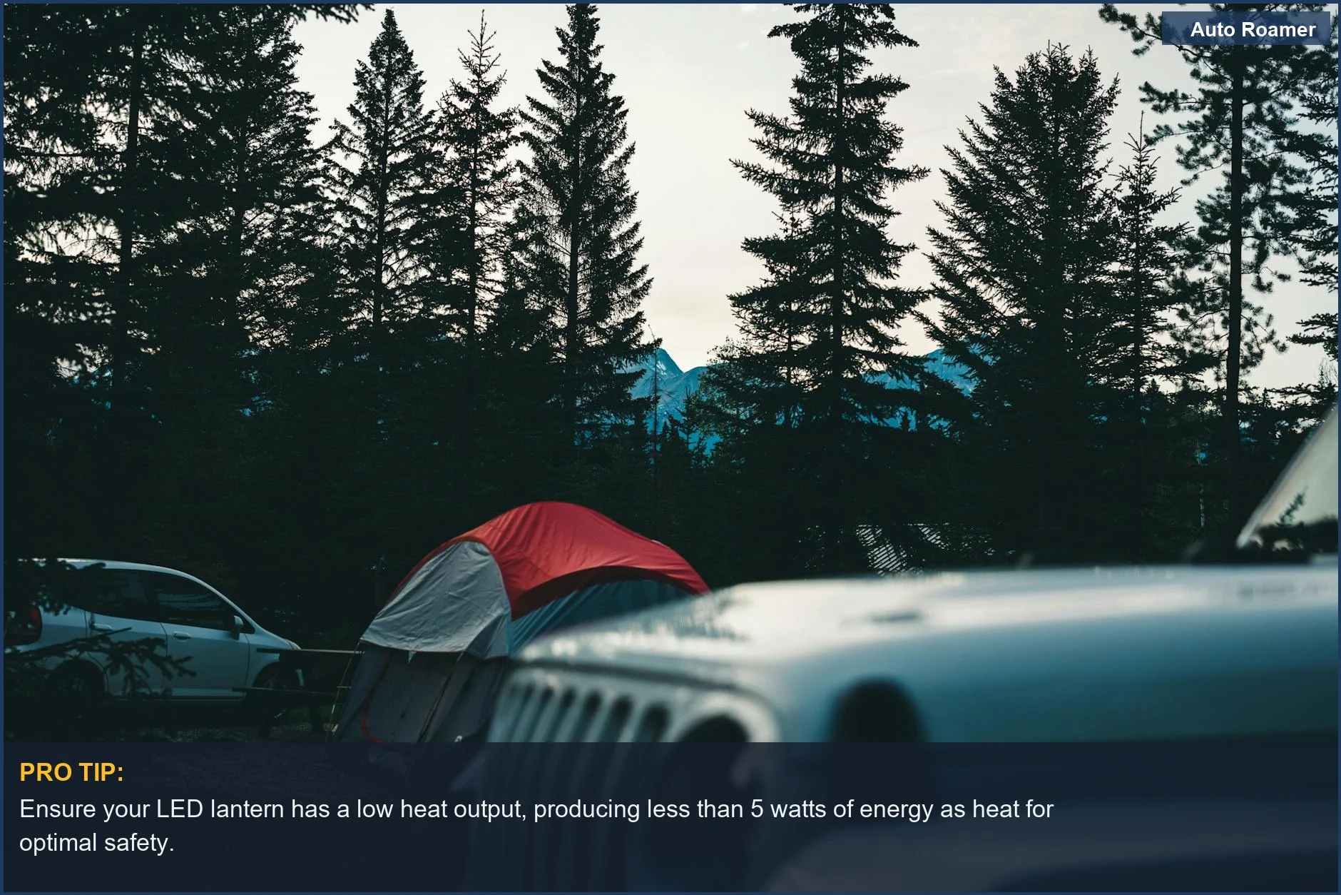 Car camping scene in a forest with tents and vehicles, illustrating LED camping lantern safety.