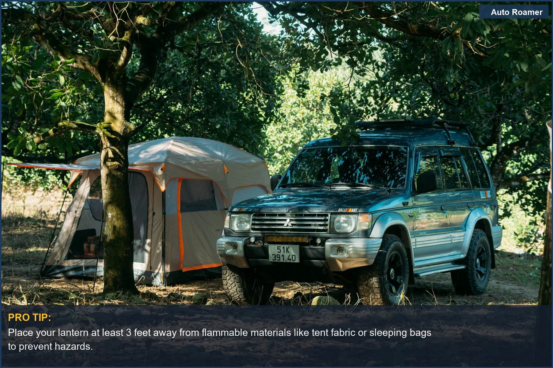 SUV parked near a tent in a forest, showcasing safe car camping lighting options.