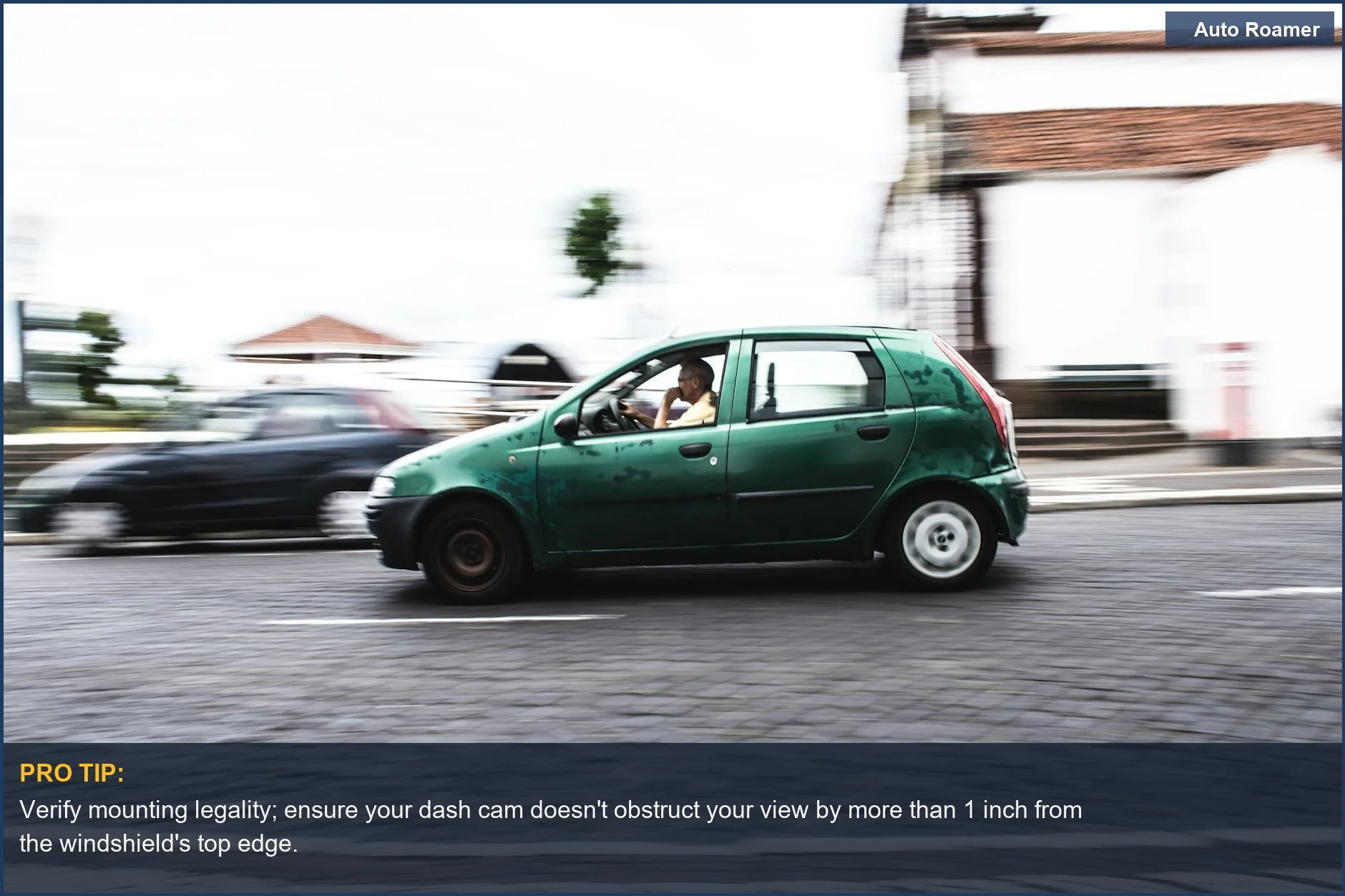 Green hatchback driving on a scenic Portuguese road, illustrating dash cam laws for travel.