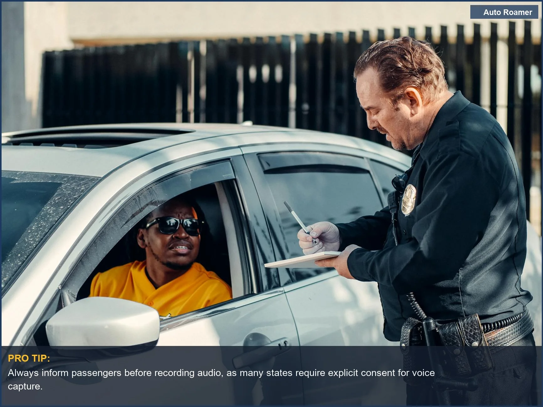 Officer writing a citation for a driver in a Ford Explorer, emphasizing privacy dashcam considerations.