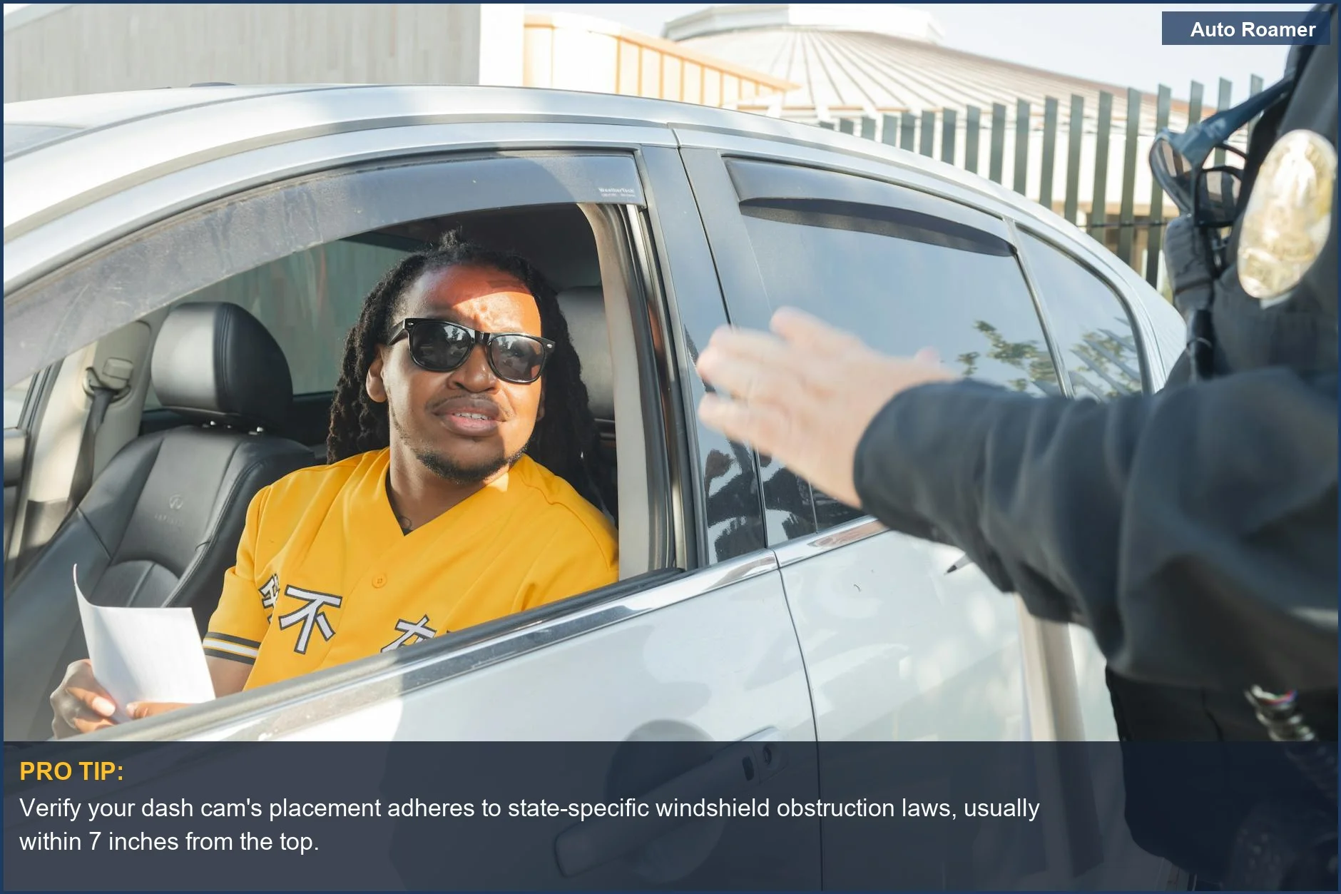 Police officer issues a ticket to a Ford Explorer driver during a traffic stop, highlighting dashcam legality.