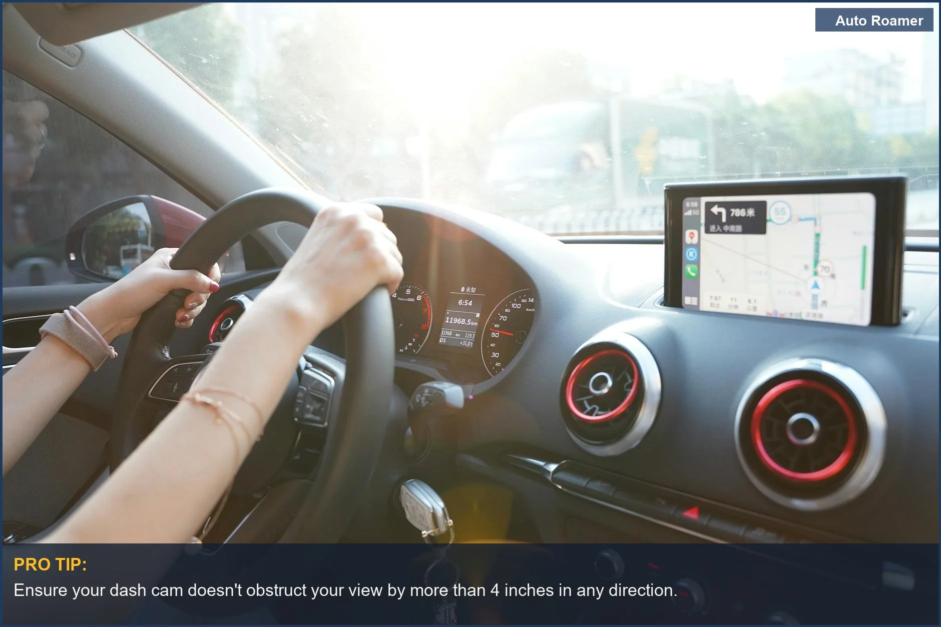 Rideshare driver's hands on steering wheel using GPS, demonstrating dash cam legality for Uber drivers.