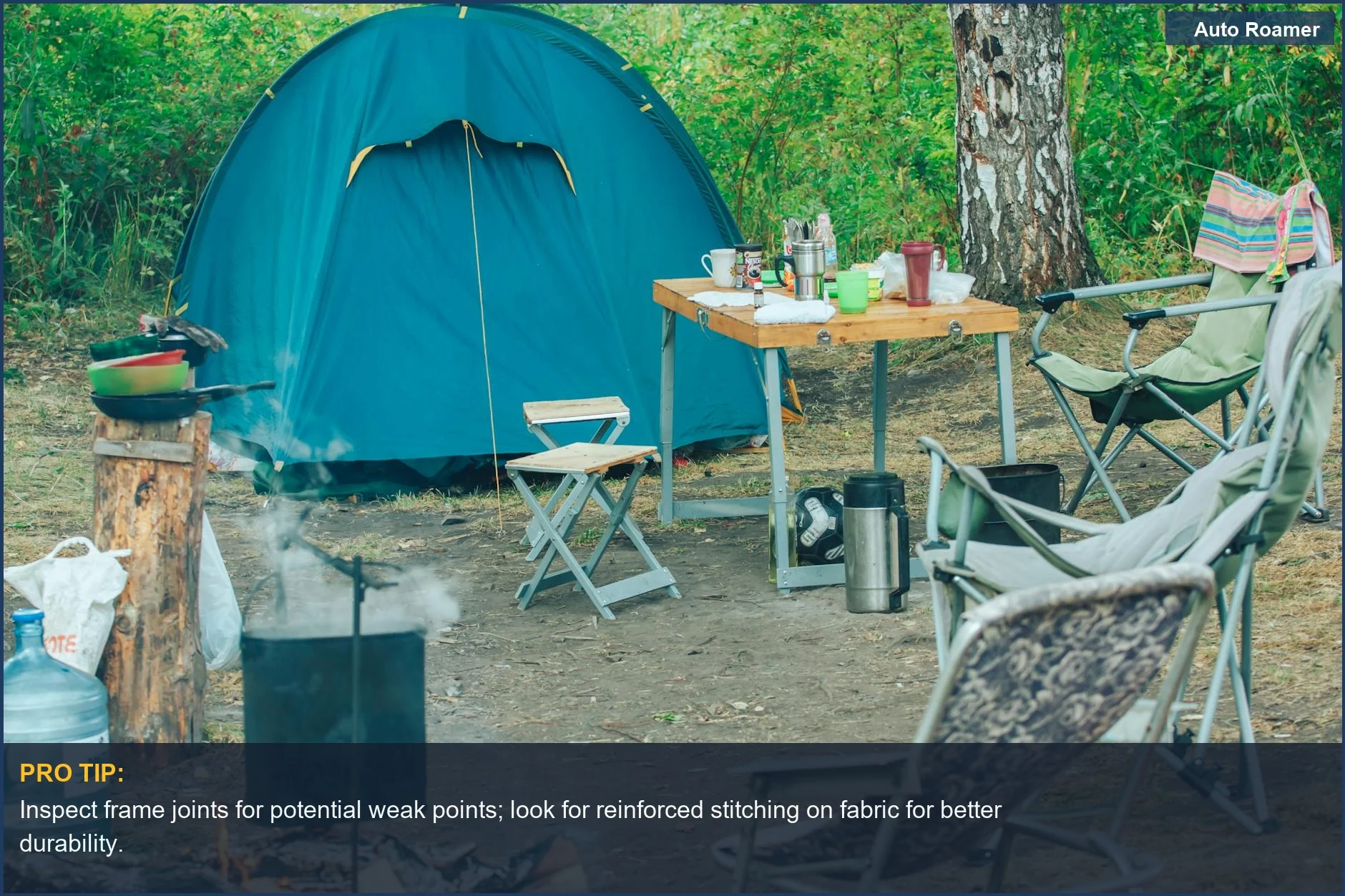 Durable camping chair setup with tent and campfire in a lush green forest.