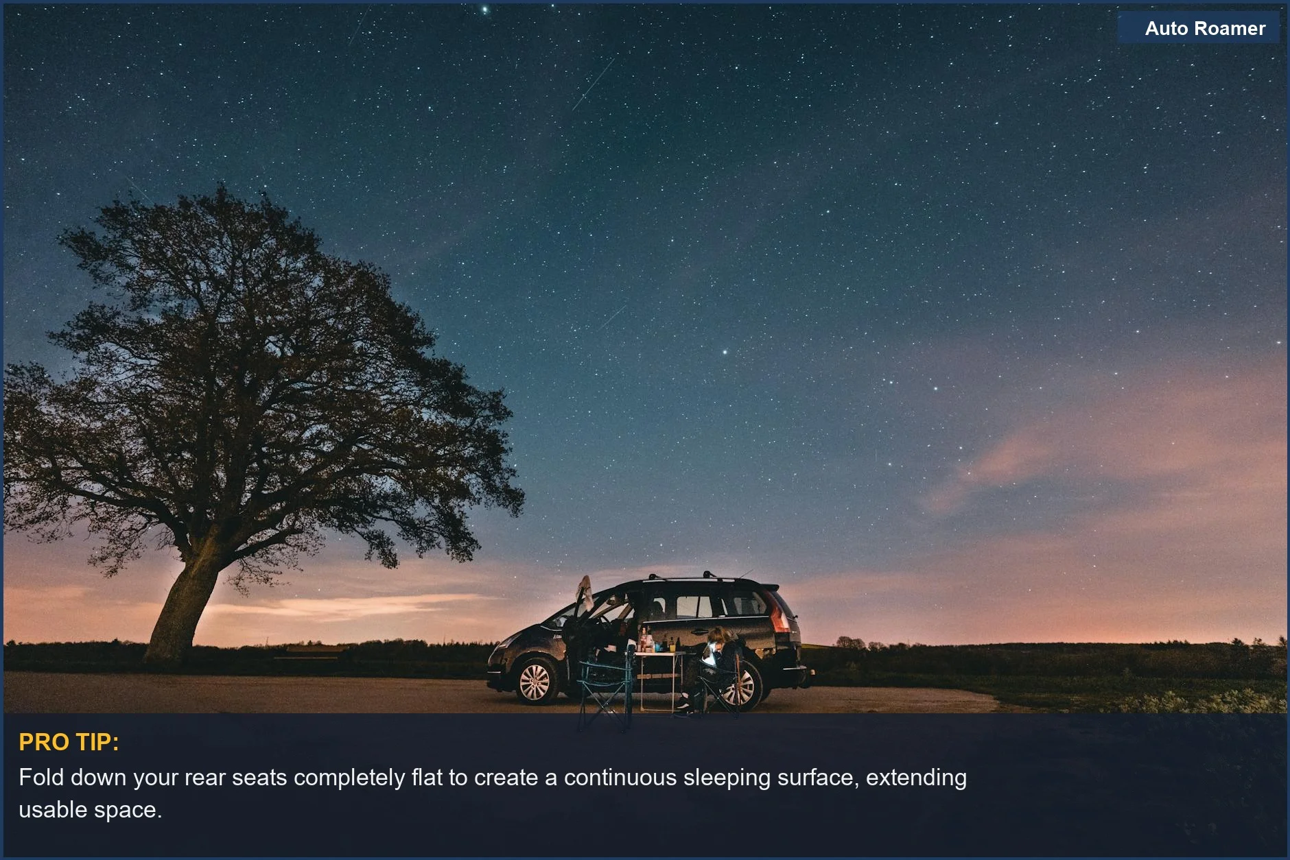 Hyundai Tucson interior with rear seats folded flat for car camping sleeping space.