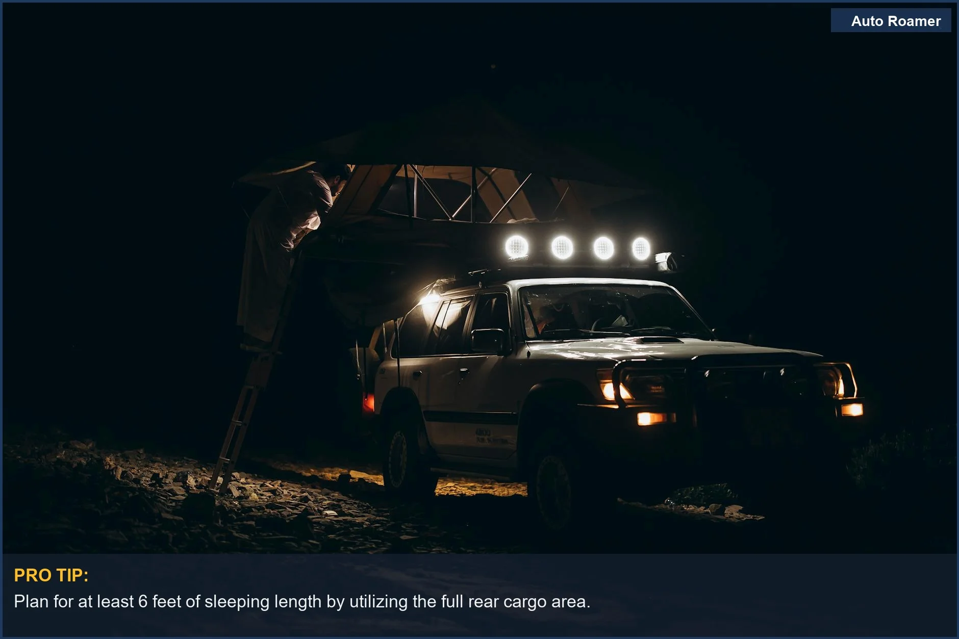 Adventure-ready Subaru Outback with an off-road camping setup under the stars in Oman.