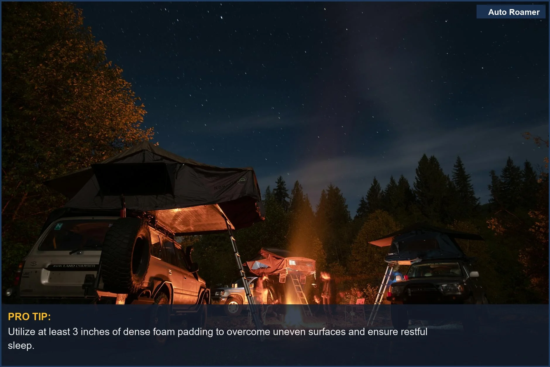 Cozy car camping sleeping arrangement in a Subaru Outback interior under a starry night sky.