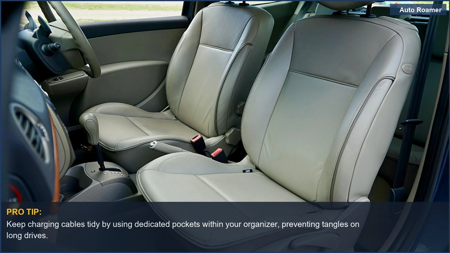Organized car interior with a backseat organizer neatly storing essentials on leather seats.