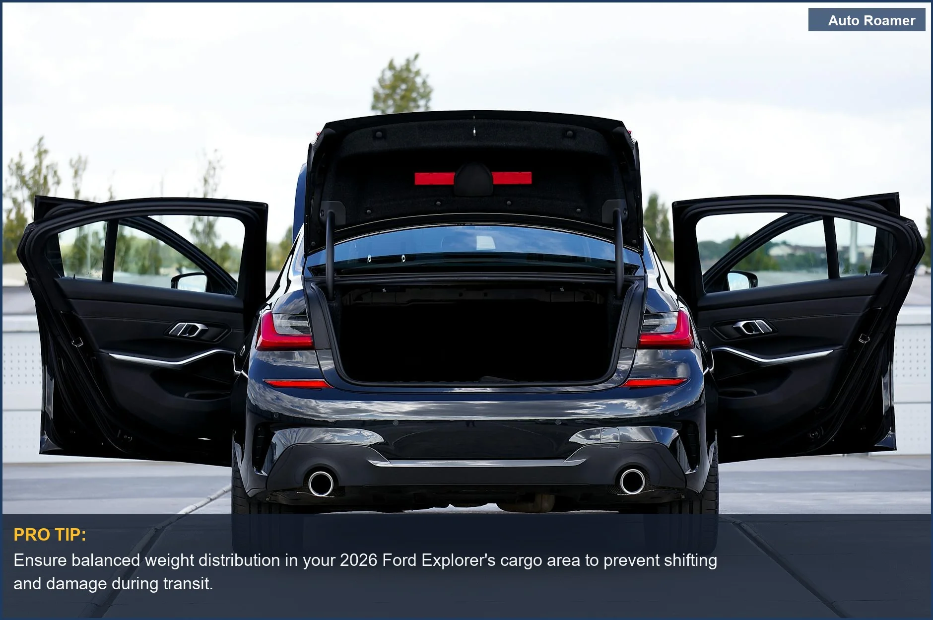 Rear view of a 2026 Ford Explorer with open trunk, showcasing spacious cargo organization for travel.