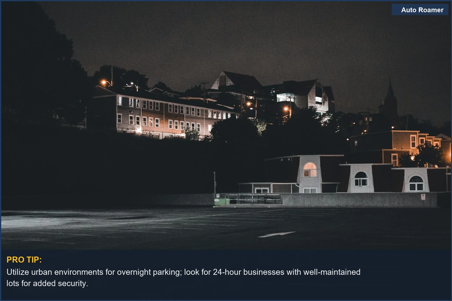 Serene urban night with illuminated buildings and an empty parking lot, perfect for car camping tips.