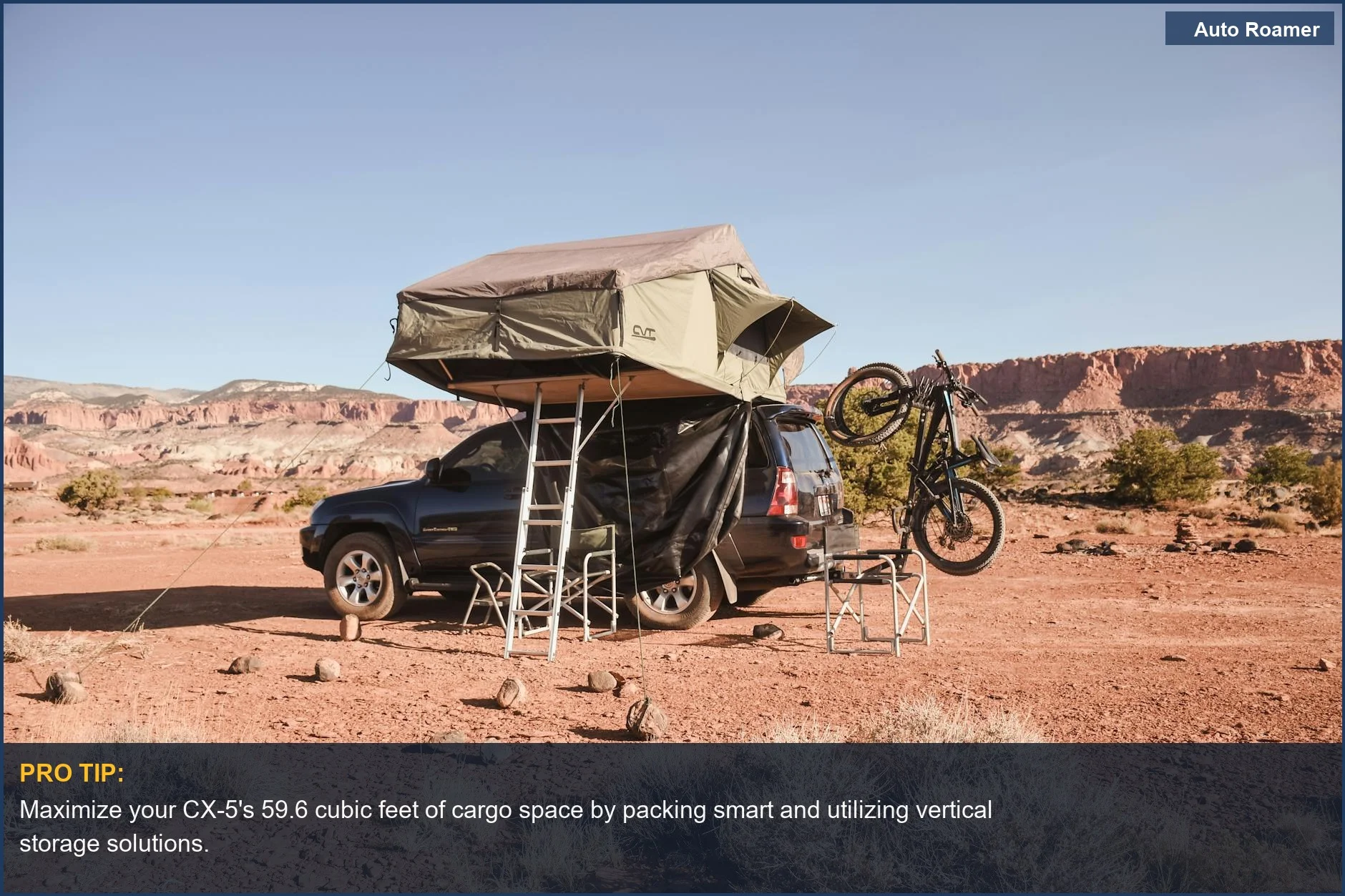 Mazda CX-5 car camping setup with rooftop tent and mountain bike ready for desert exploration.