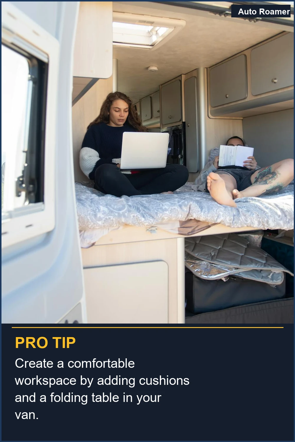 Create a comfortable workspace by adding cushions and a folding table in your van.