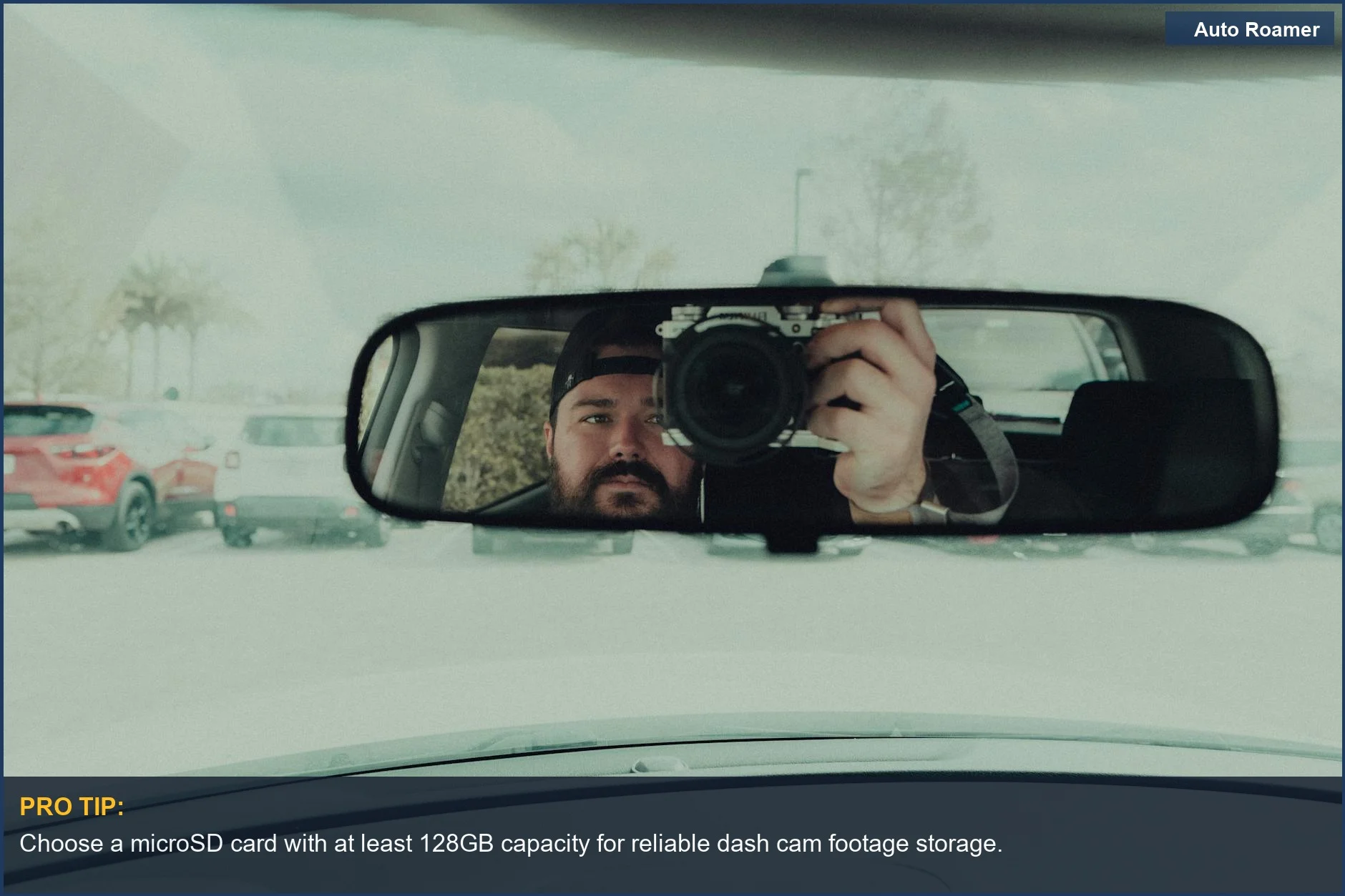 Man using camera in car mirror to check dash cam SD card readiness for recording.