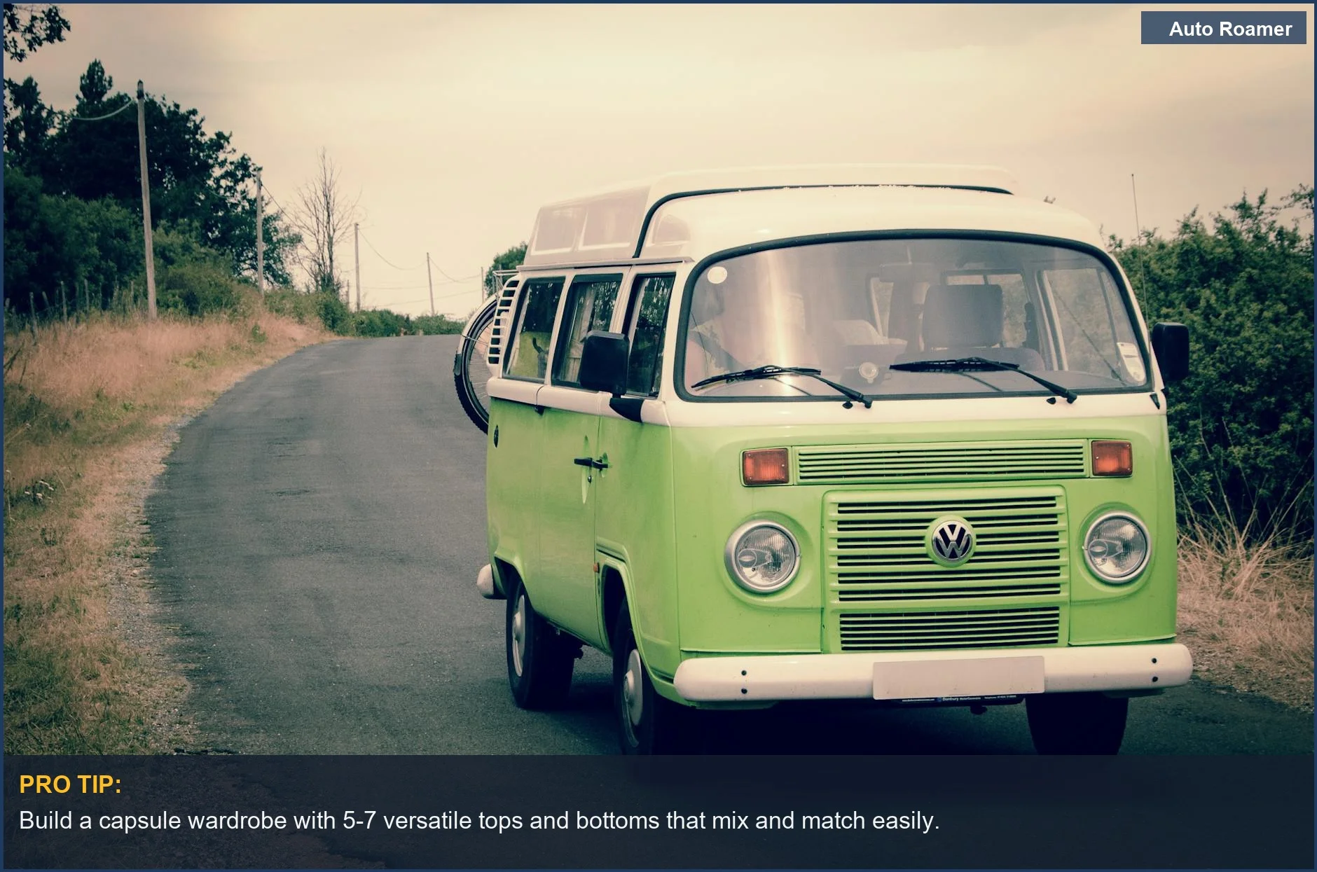 Green campervan driving on a country road, ideal for minimalist travel on extended road trips.