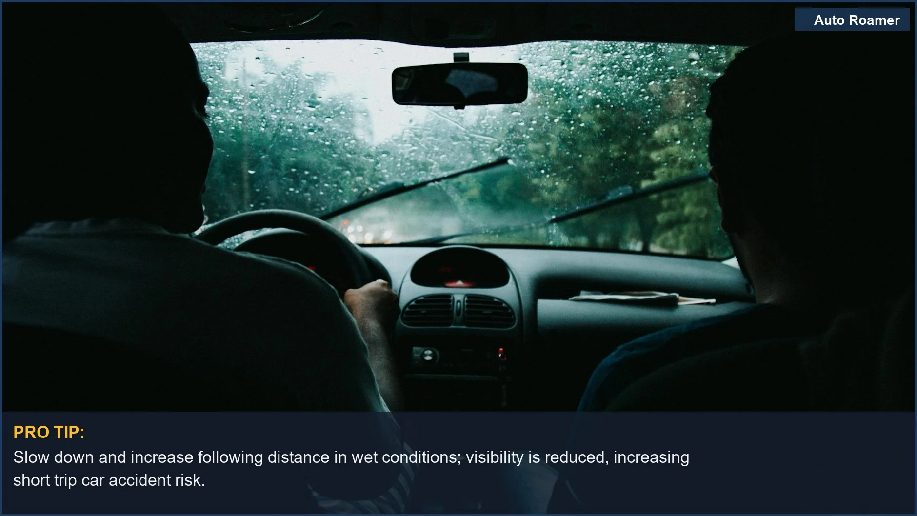 Two people driving through rainy São Paulo streets, with a wet windshield and visible raindrops, a common scenario for short trip car accident risk.