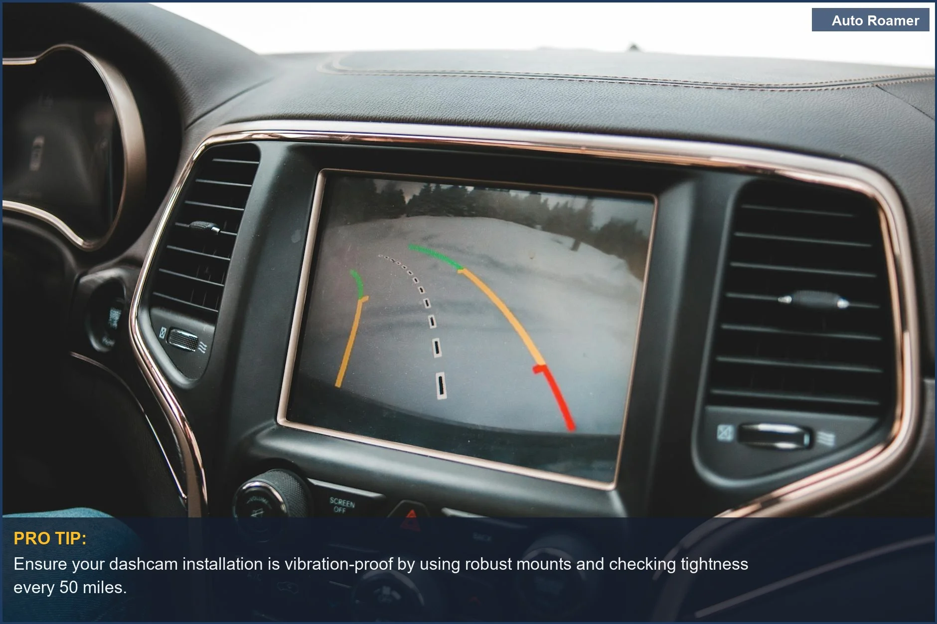 Car dashboard with rearview camera display demonstrates why secure camera placement is crucial for towing.
