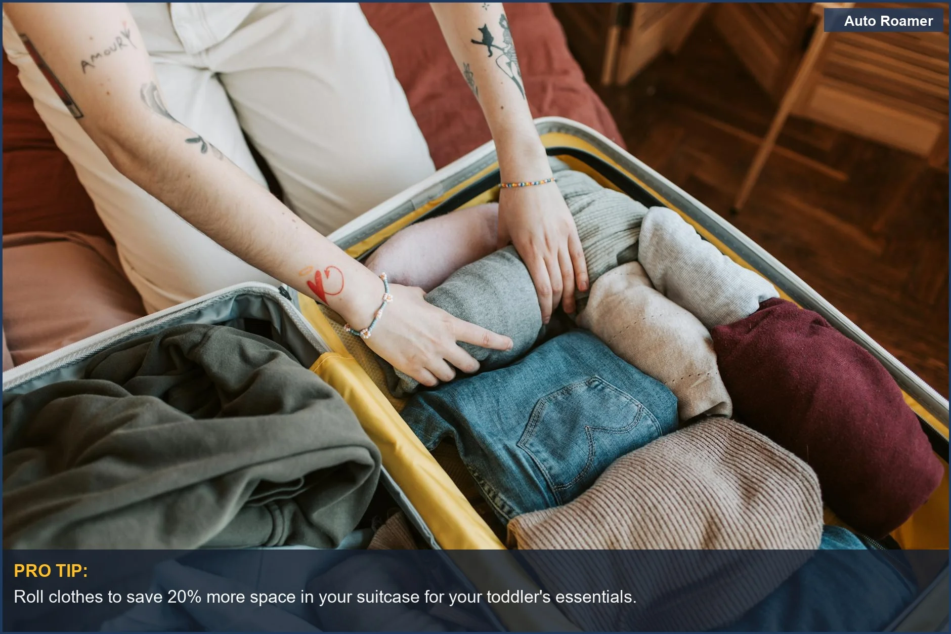 Close-up of hands neatly folding toddler clothes into a suitcase for smart travel packing.