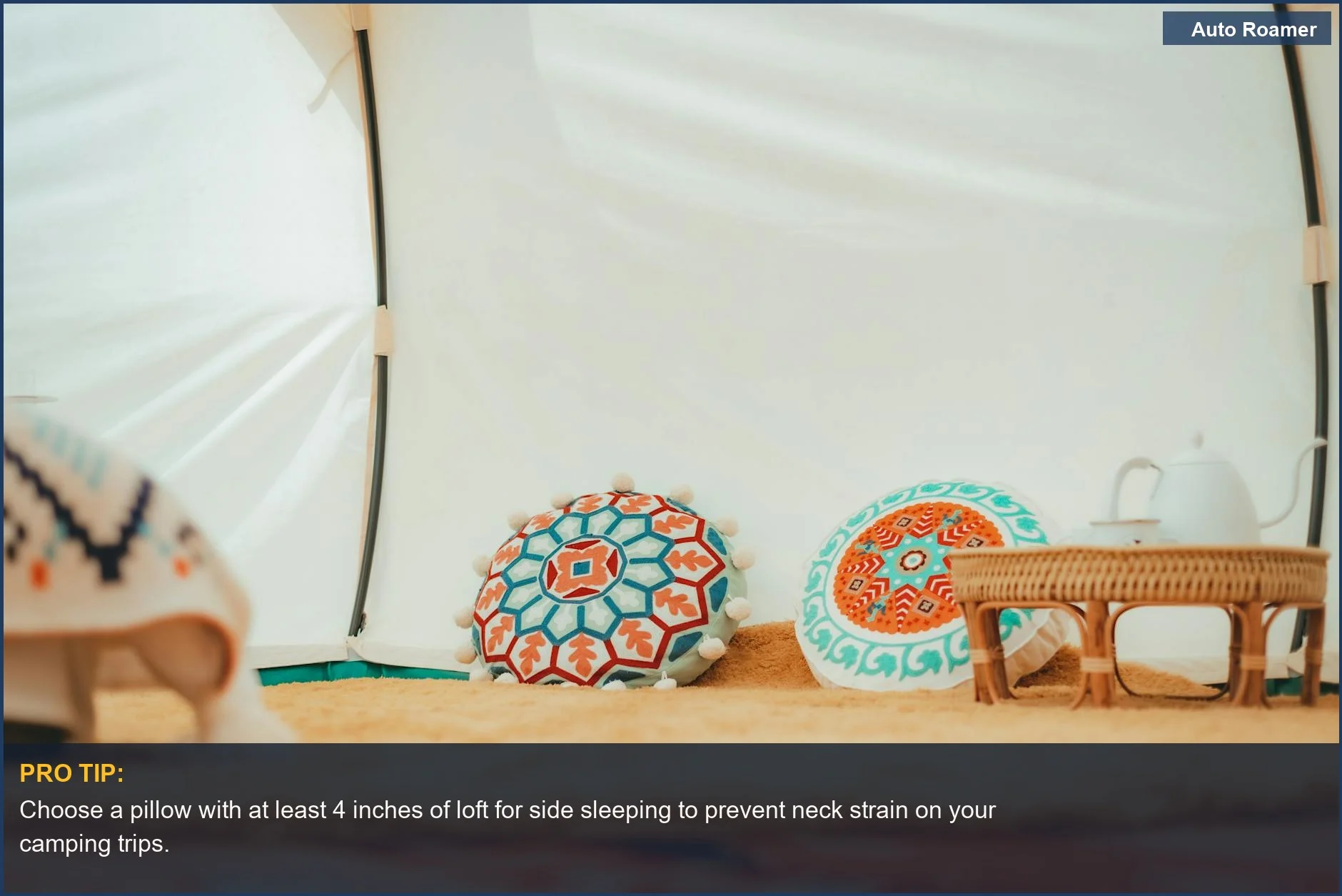 Cozy tent interior with colorful pillows and a teapot, illustrating the importance of car camping pillow loft for comfort.
