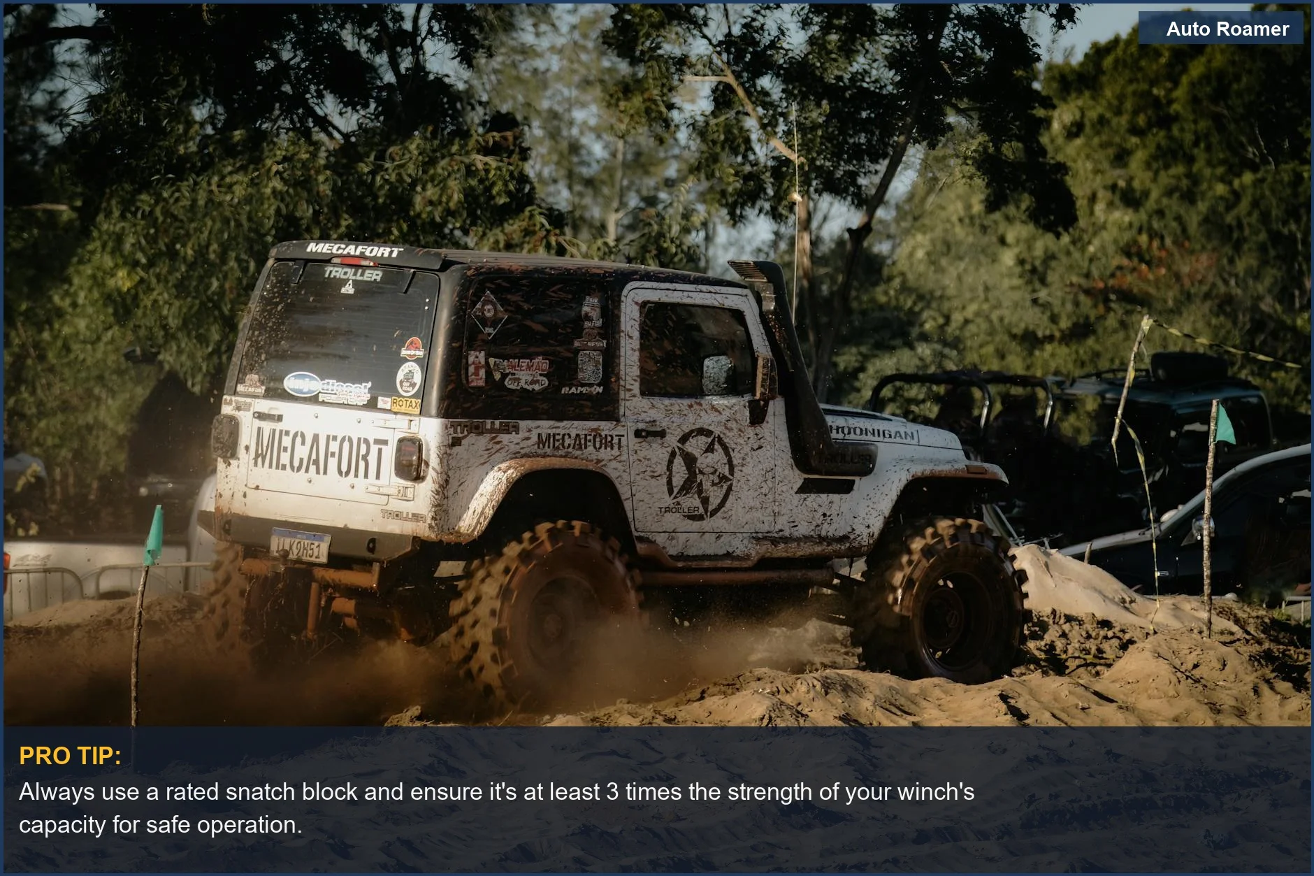 White 4x4 navigating challenging terrain, illustrating the need for proper off-road safety accessories.
