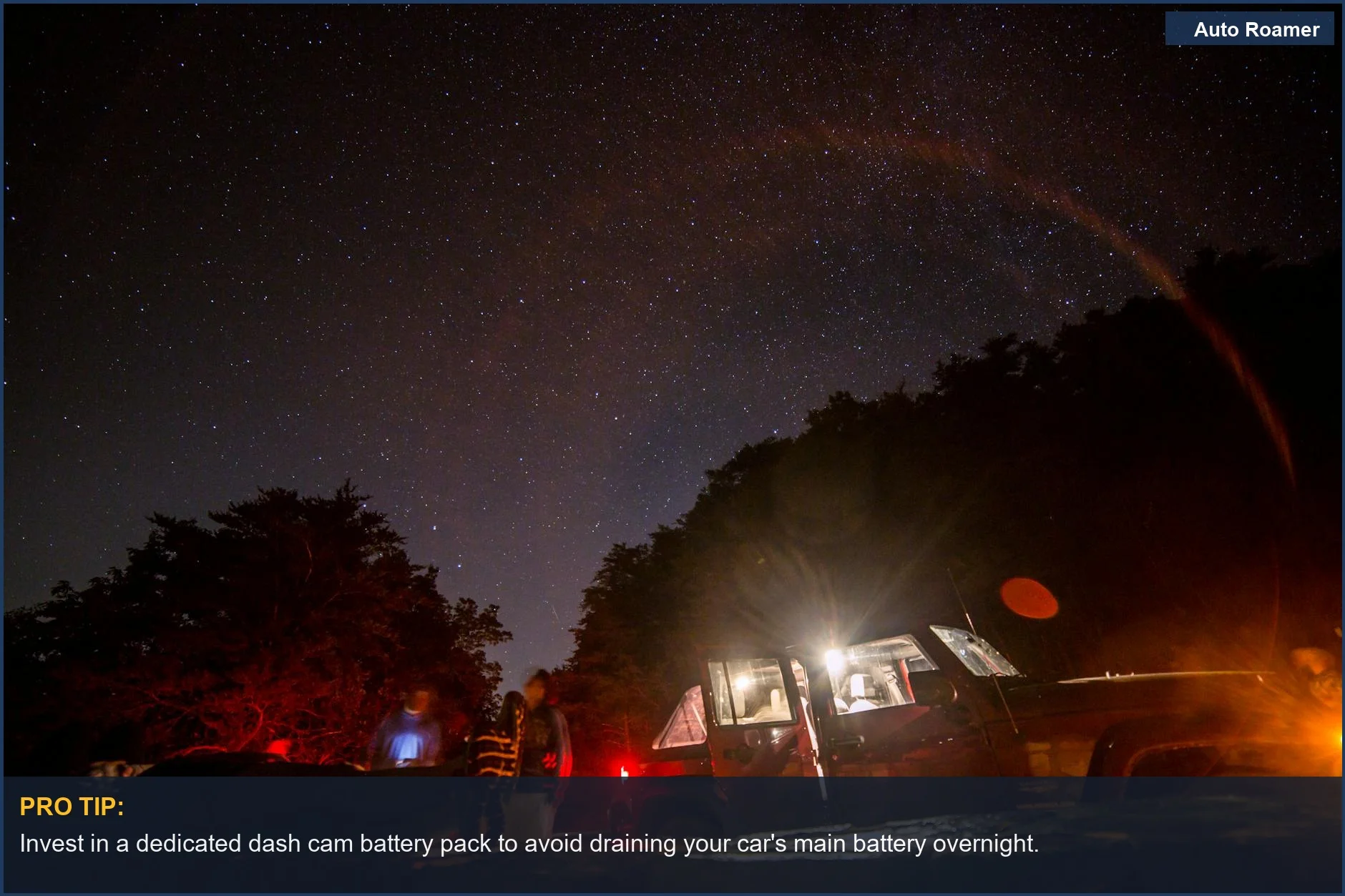 Starry night camping with car lights illuminating wilderness, showing dash cam power solutions.