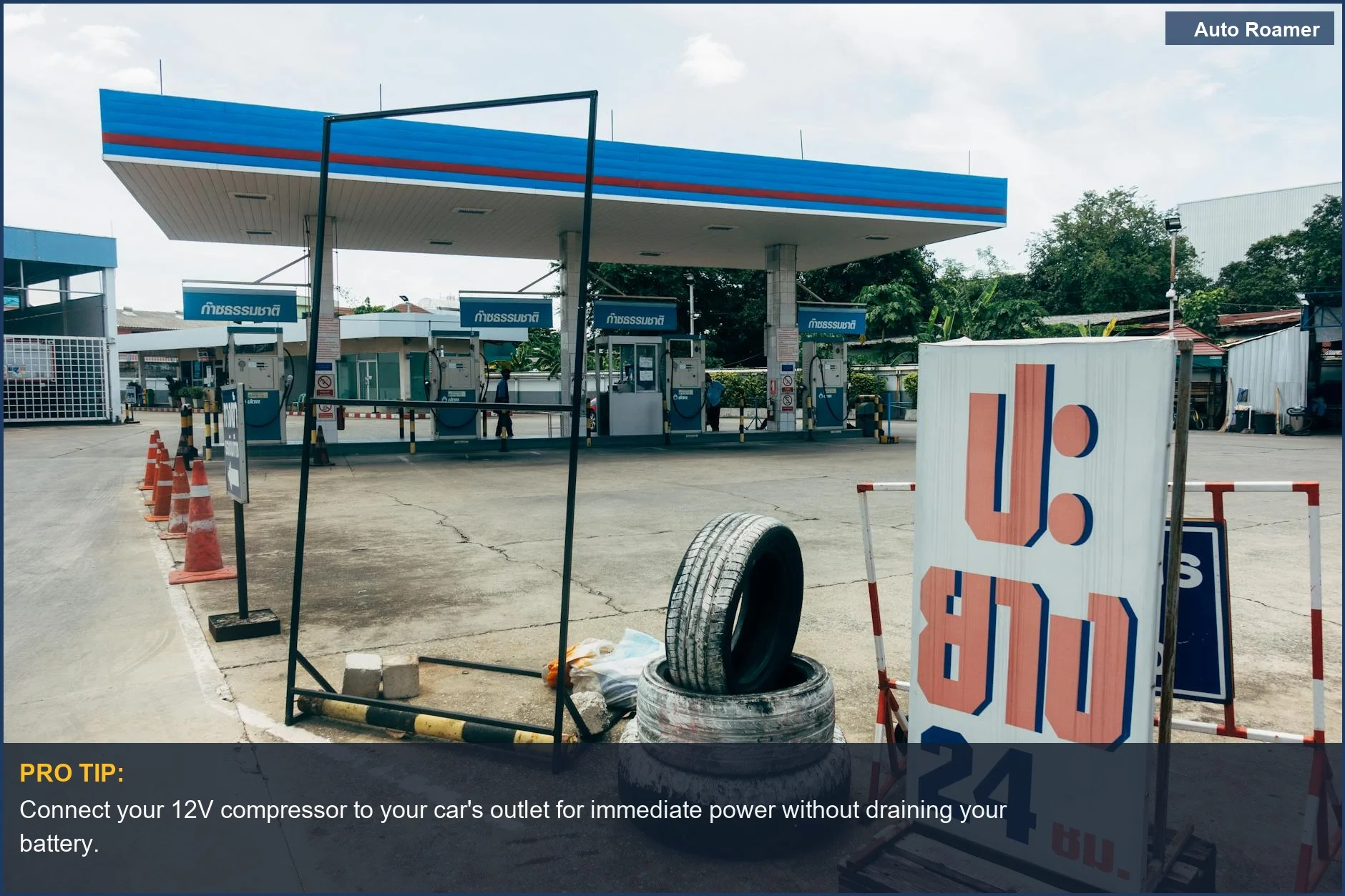Modern gas station with tire repair sign, illustrating portable air compressor power options.